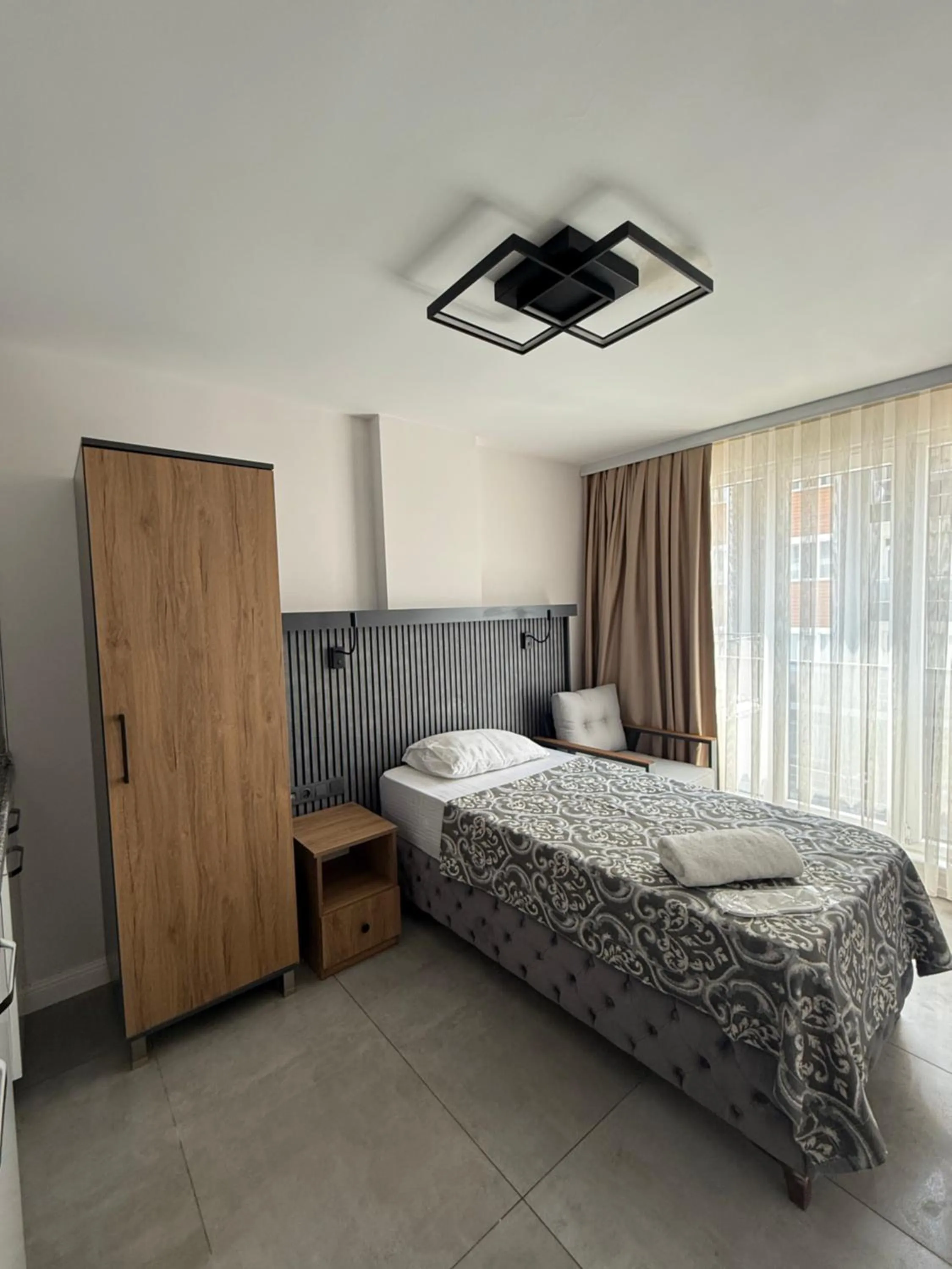 Bed in D'Premium Hotel