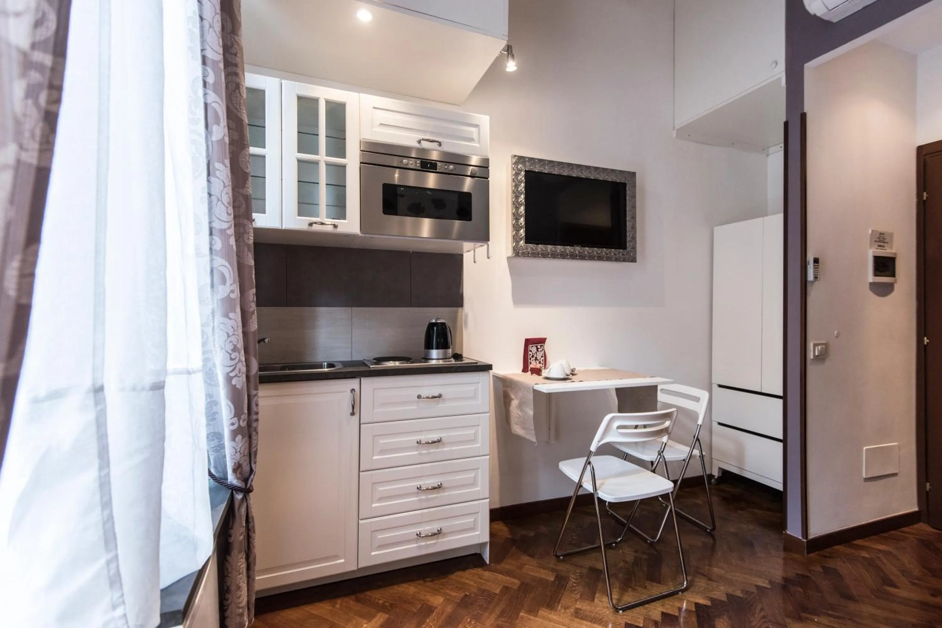 Kitchen or kitchenette in Vite Suites Guest House