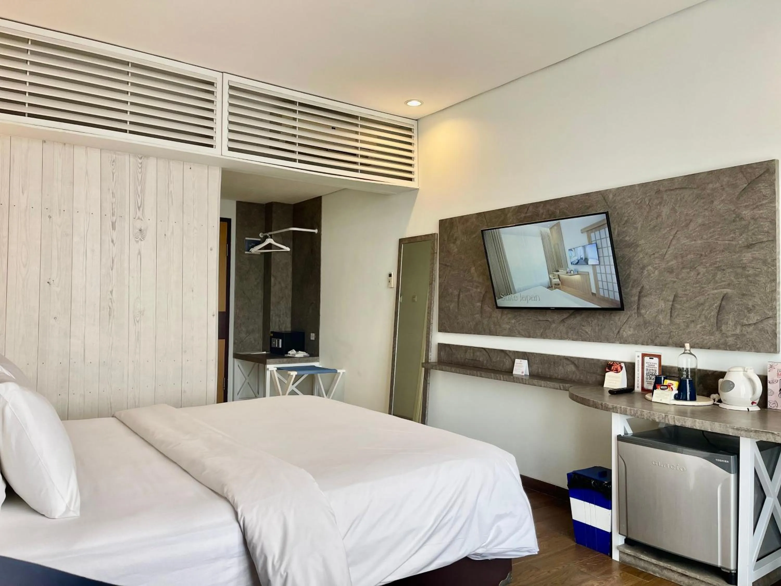 Bed in Hemangini Hotel Bandung