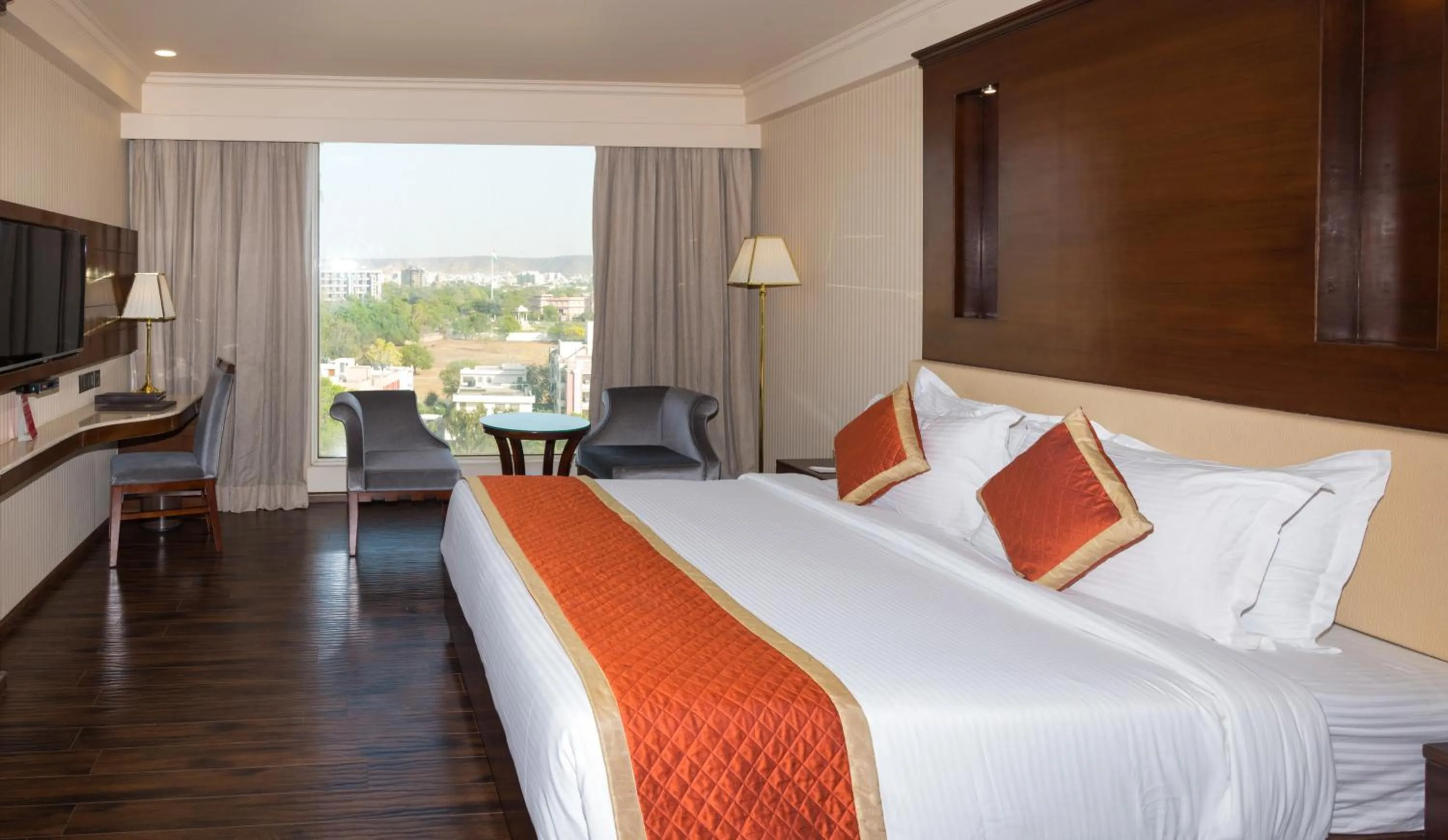 Bed in Shakun Hotels And Resorts