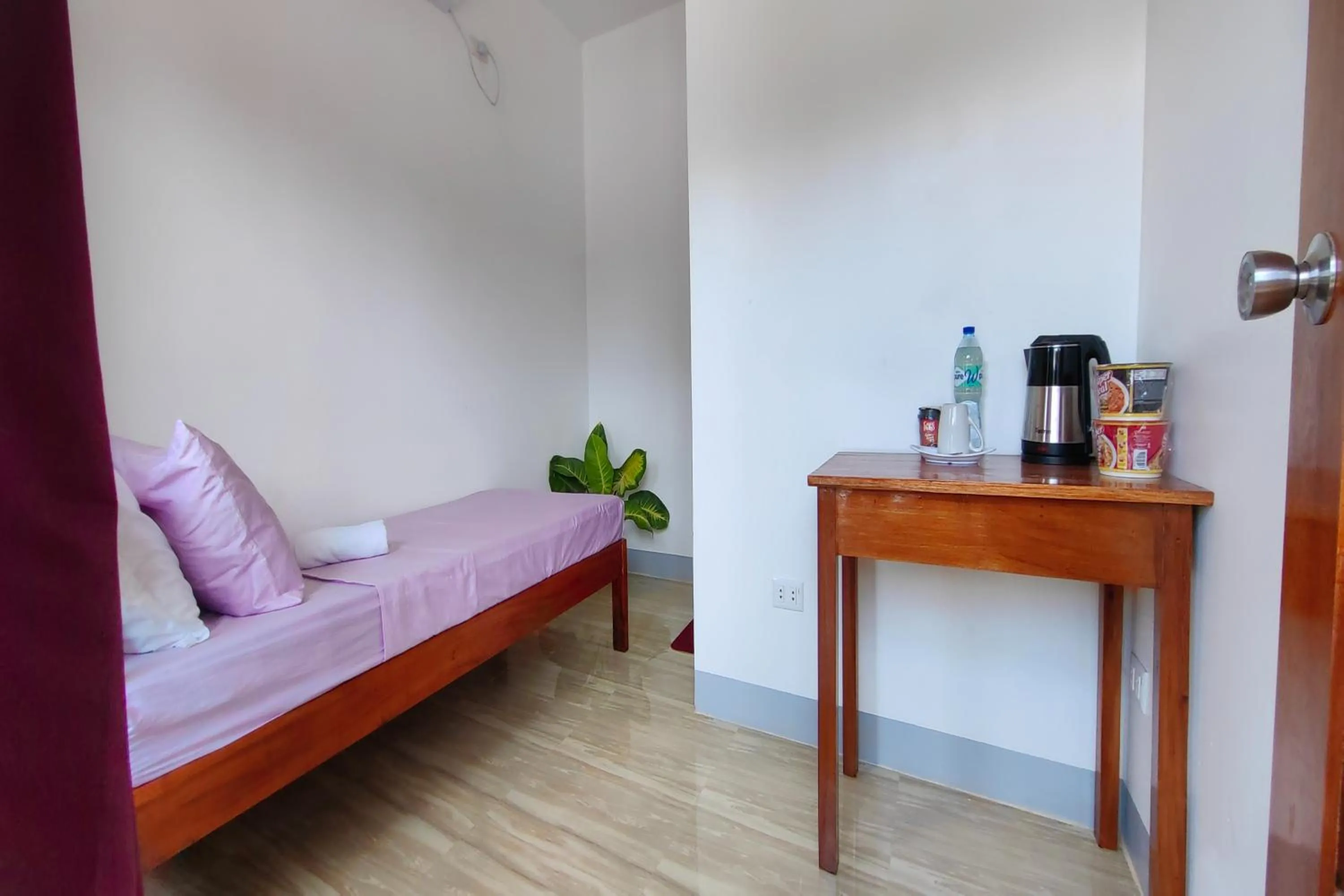 Bed in Kamalay Pension House