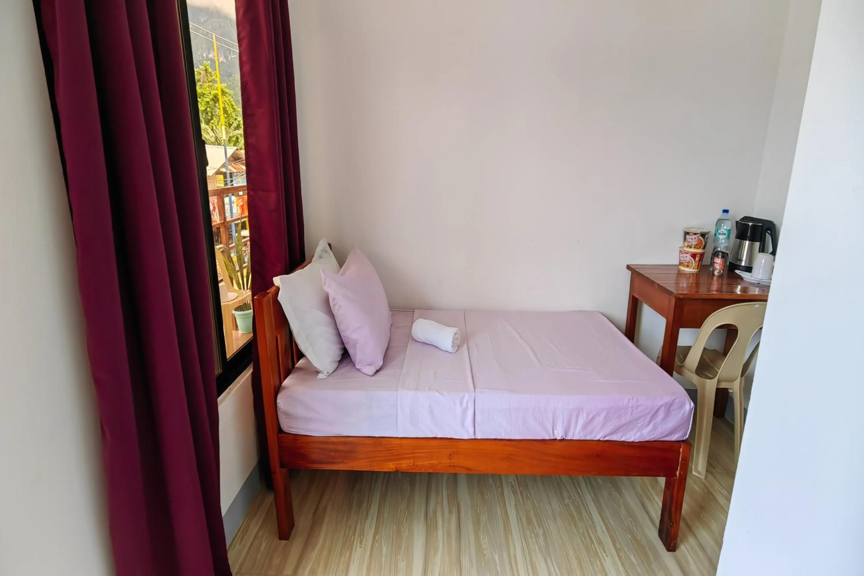 Bed in Kamalay Pension House