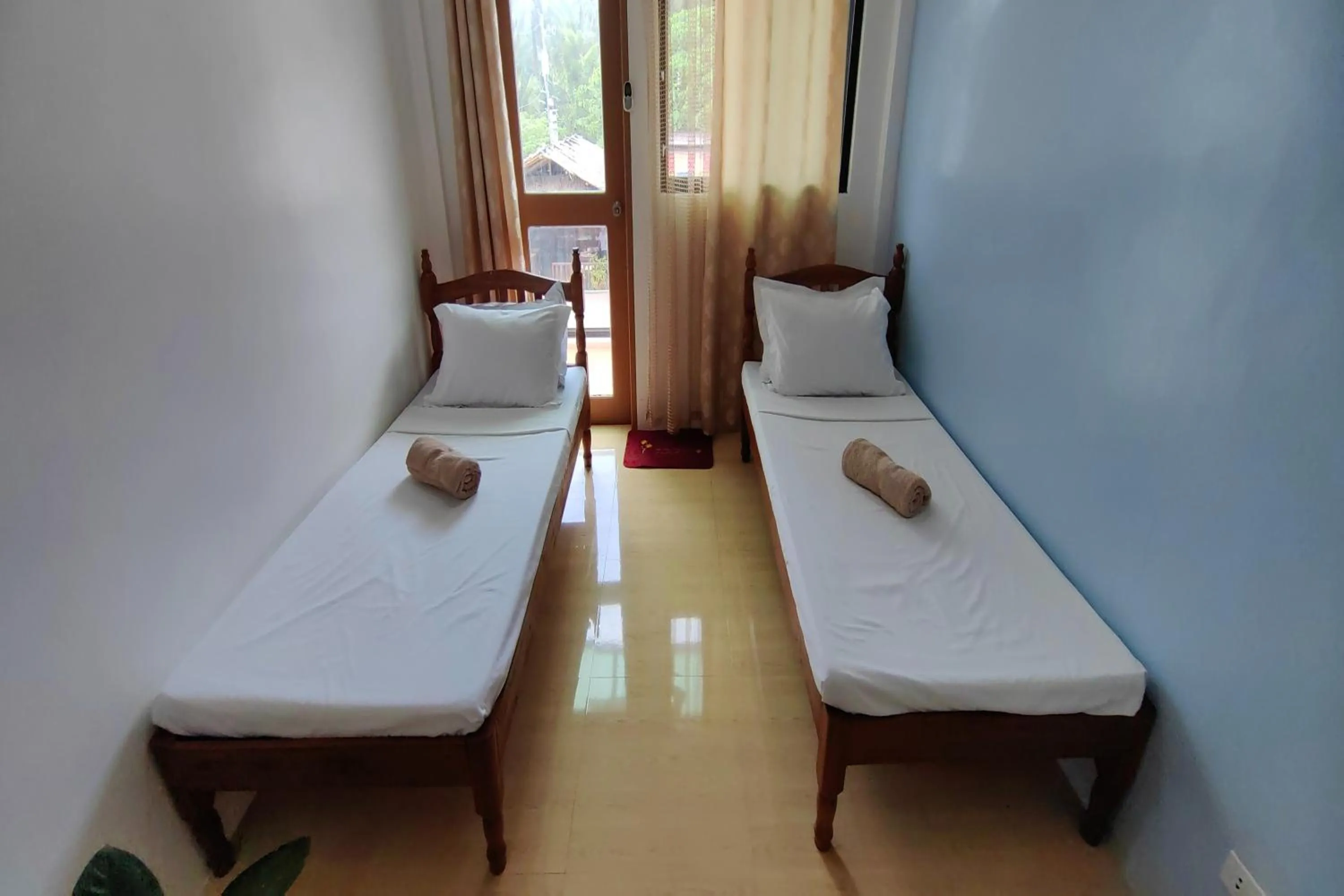 Bed in Kamalay Pension House