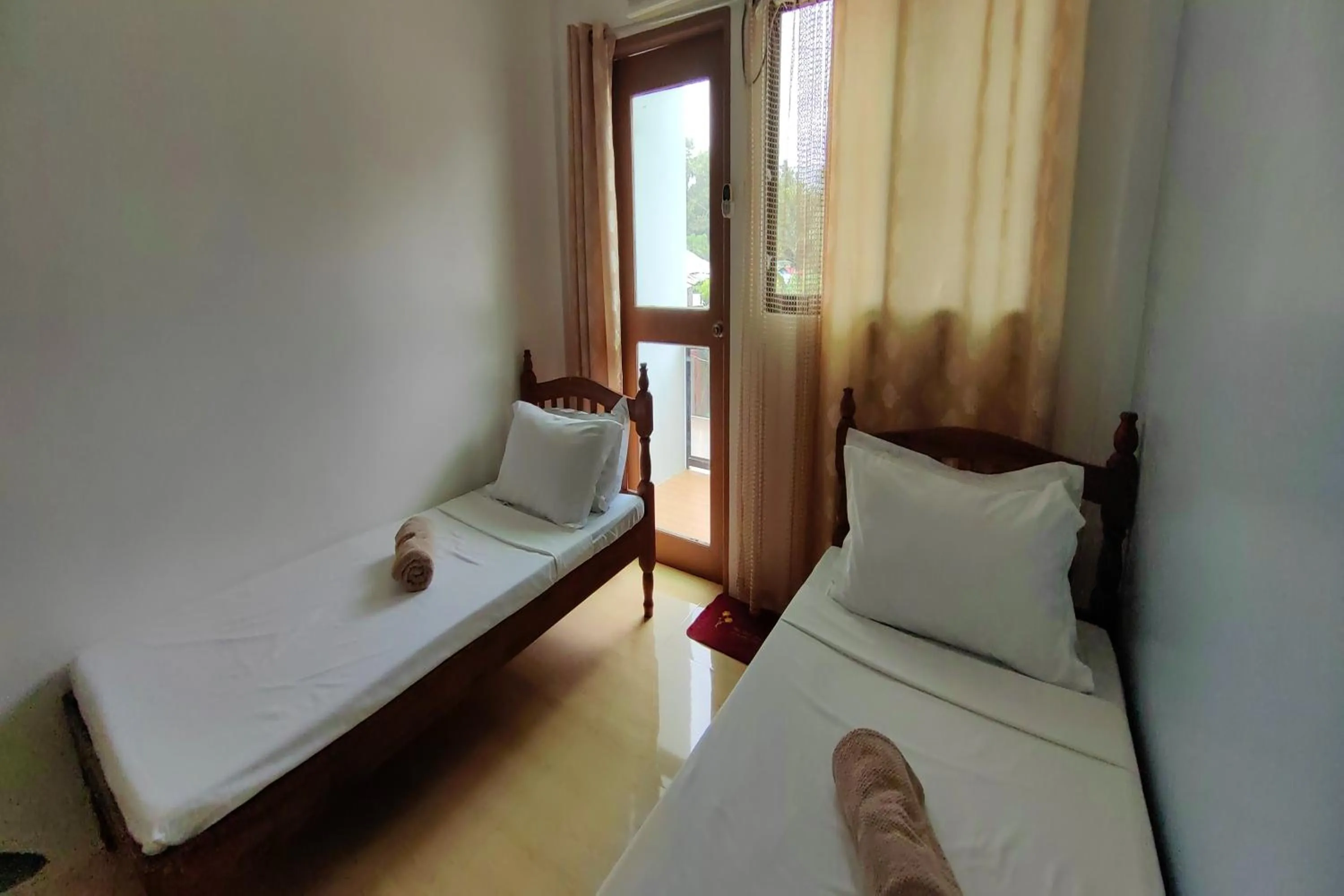 Bed in Kamalay Pension House