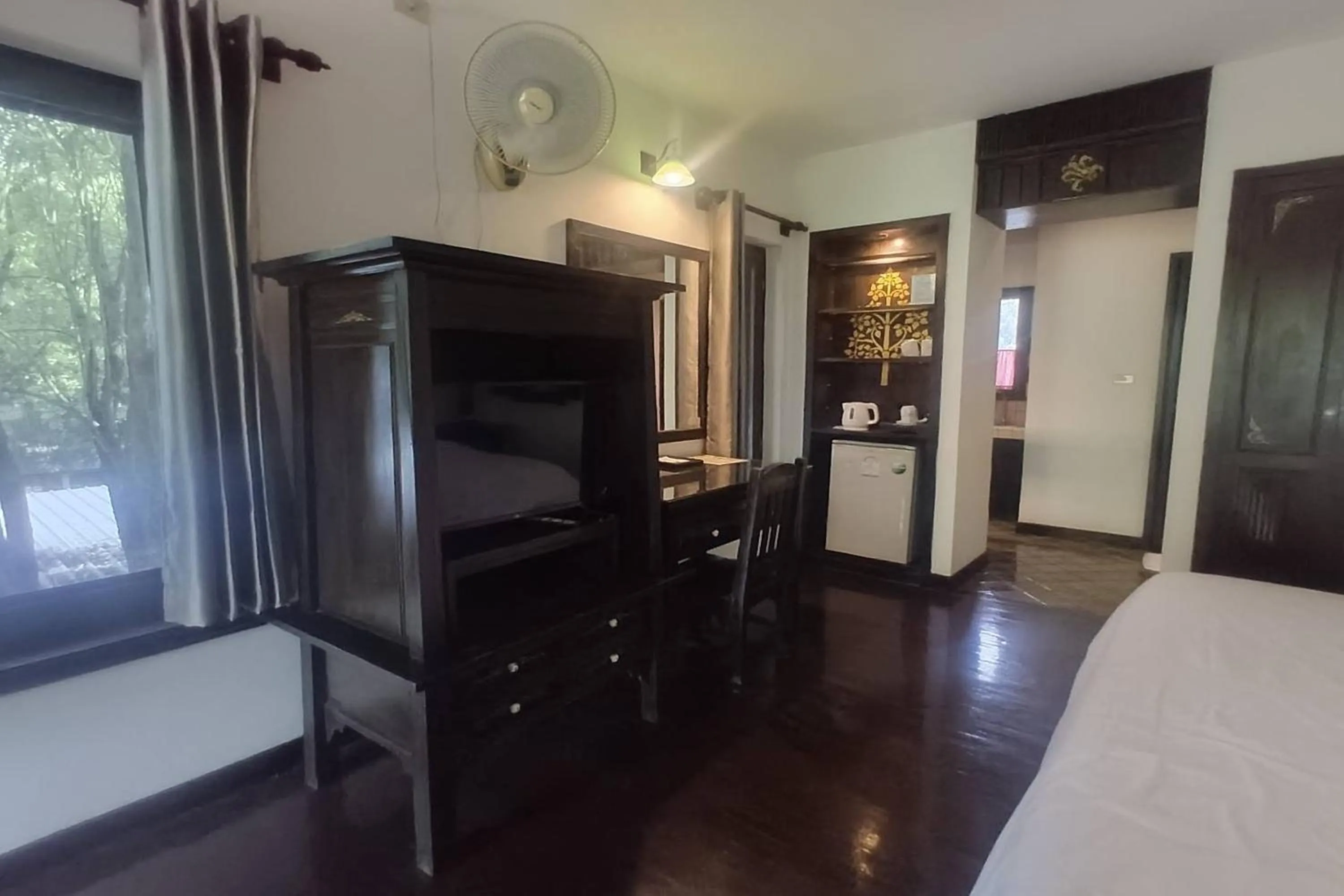 Photo of the whole room, Bed in Baan Orawee Boutique Hotel