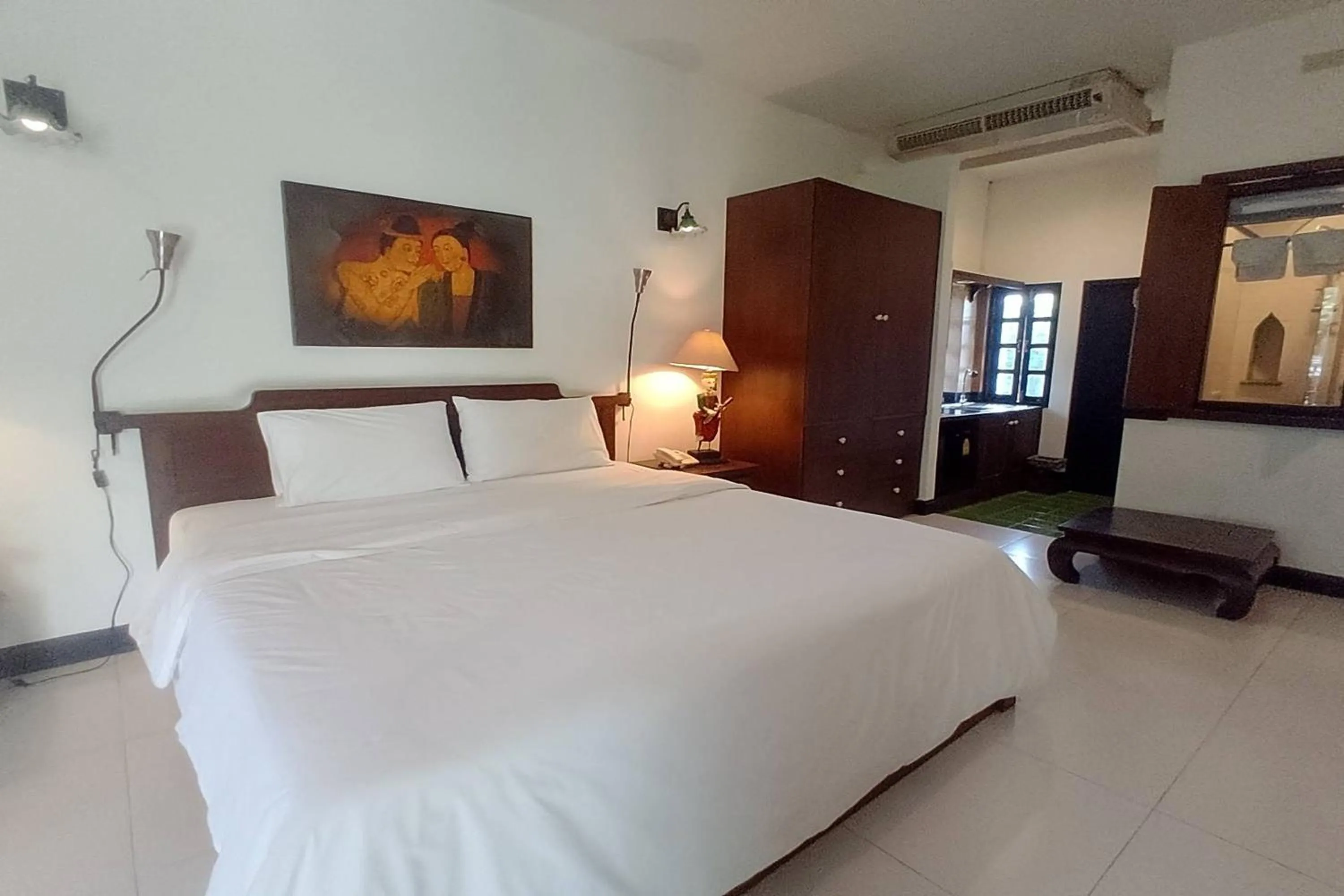 Bed in Baan Orawee Boutique Hotel