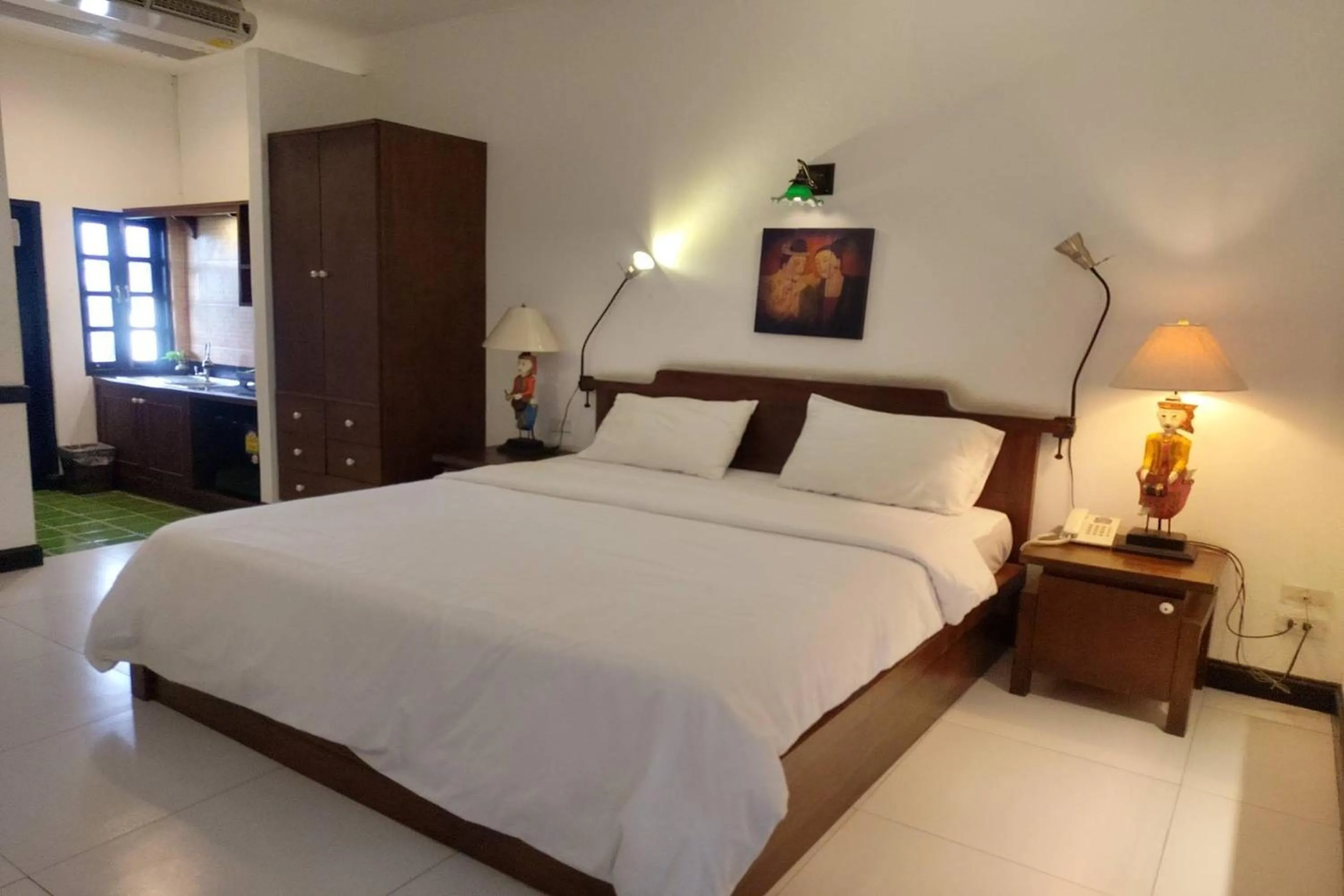 Bed in Baan Orawee Boutique Hotel