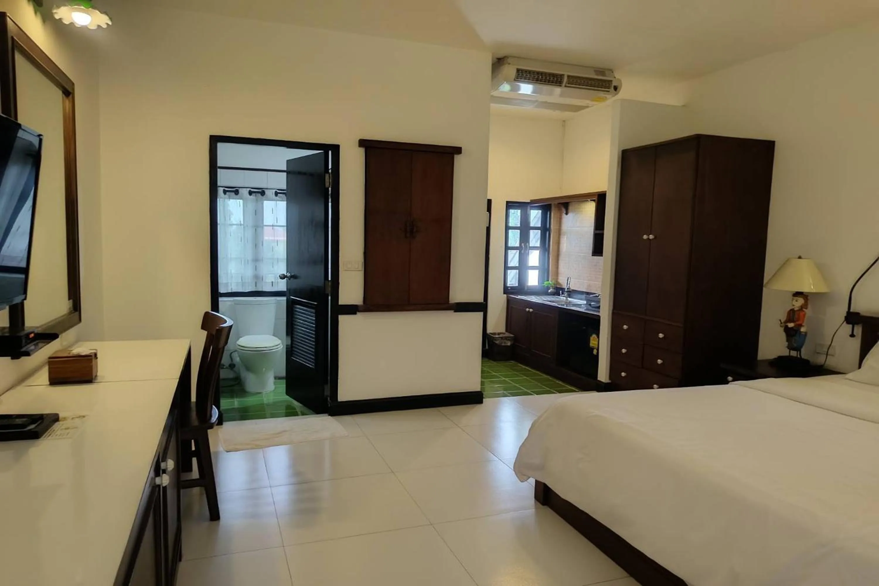 Bed in Baan Orawee Boutique Hotel