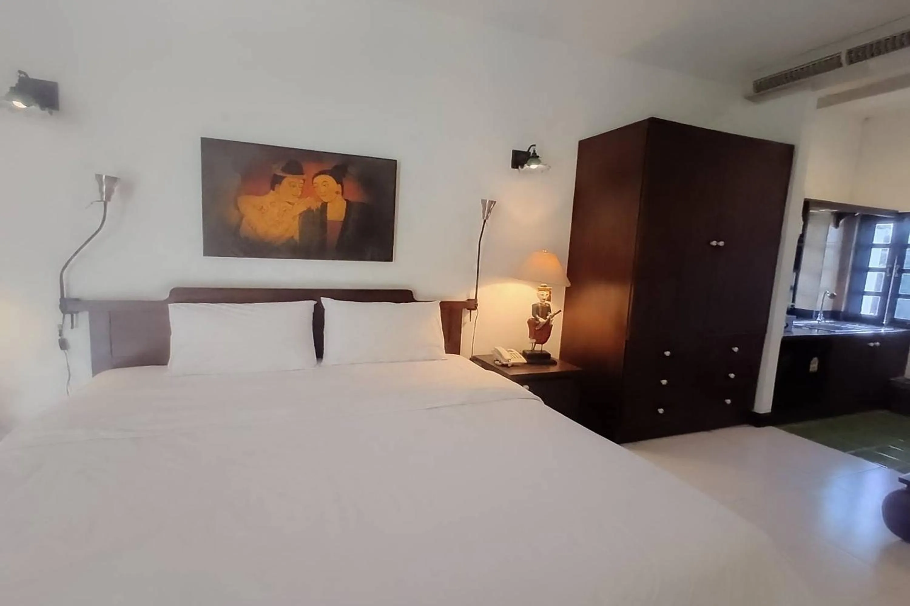 Bed in Baan Orawee Boutique Hotel