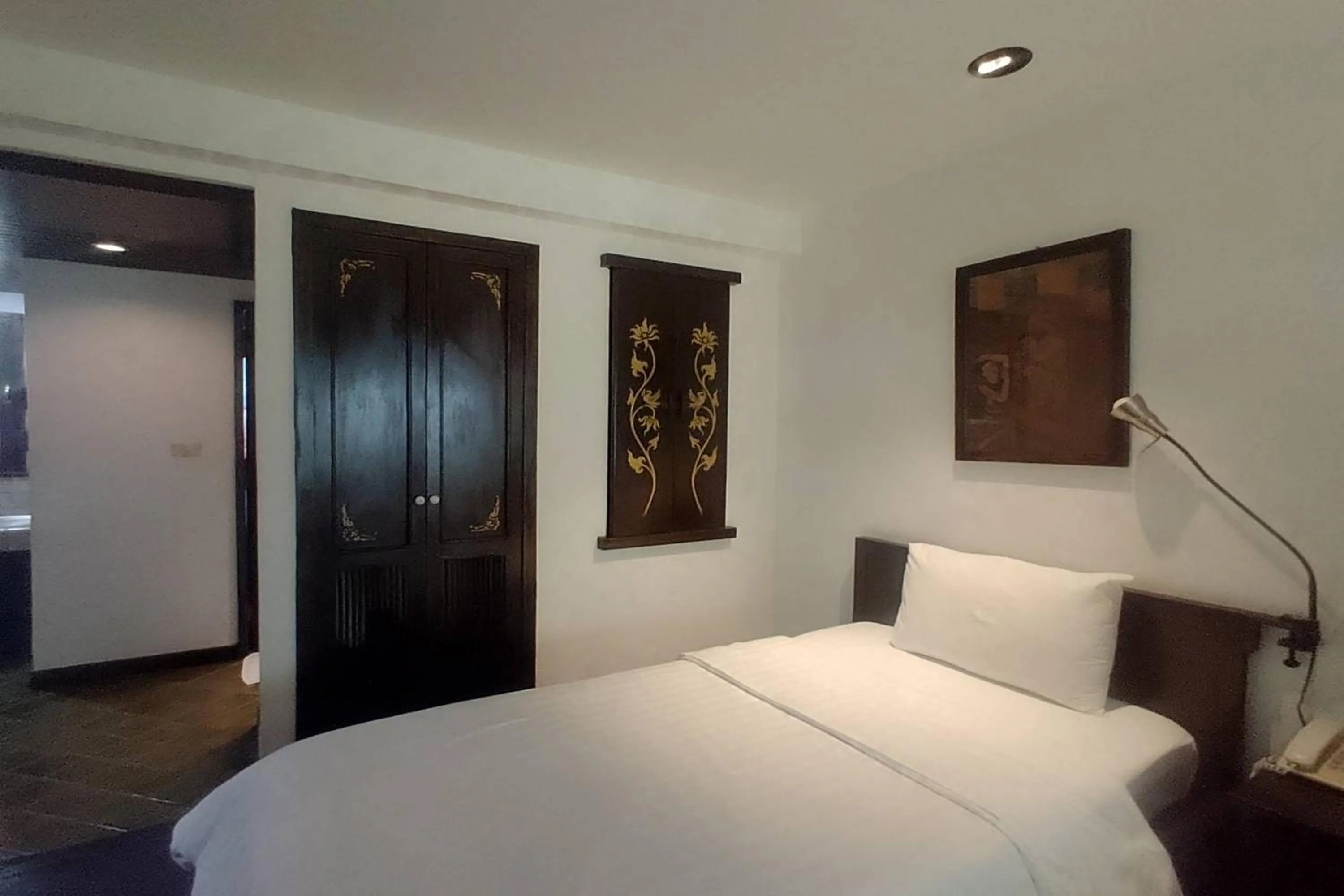 Bed in Baan Orawee Boutique Hotel