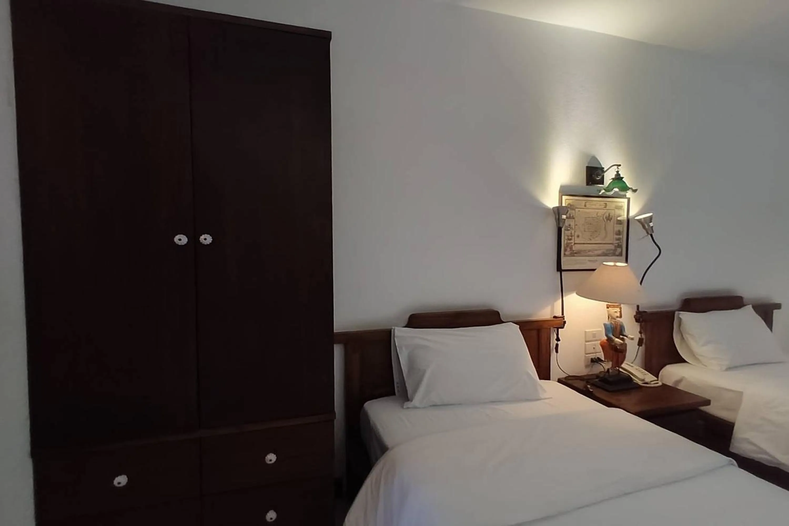 Bed in Baan Orawee Boutique Hotel