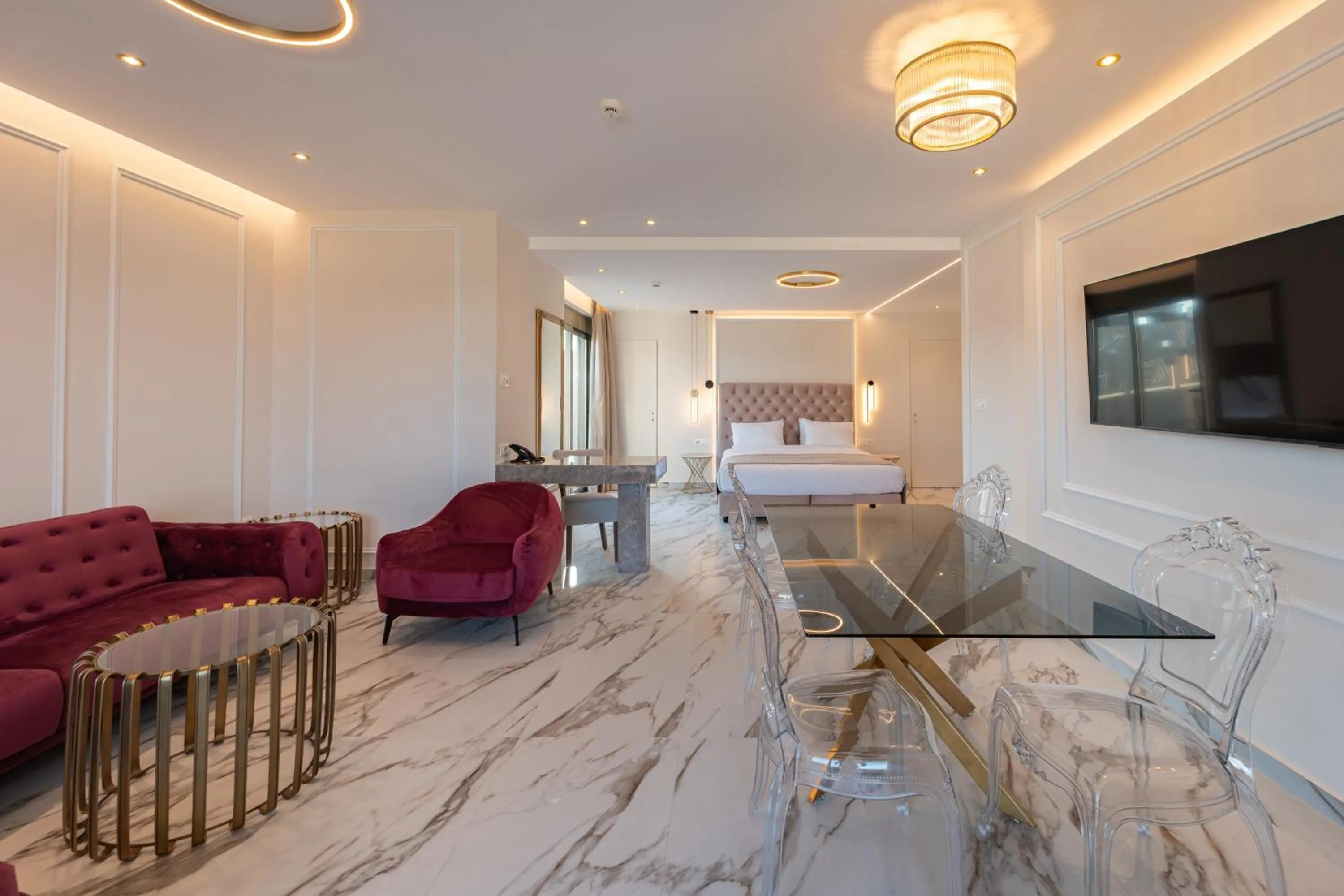 Living room, Bed in Philia Center Suites