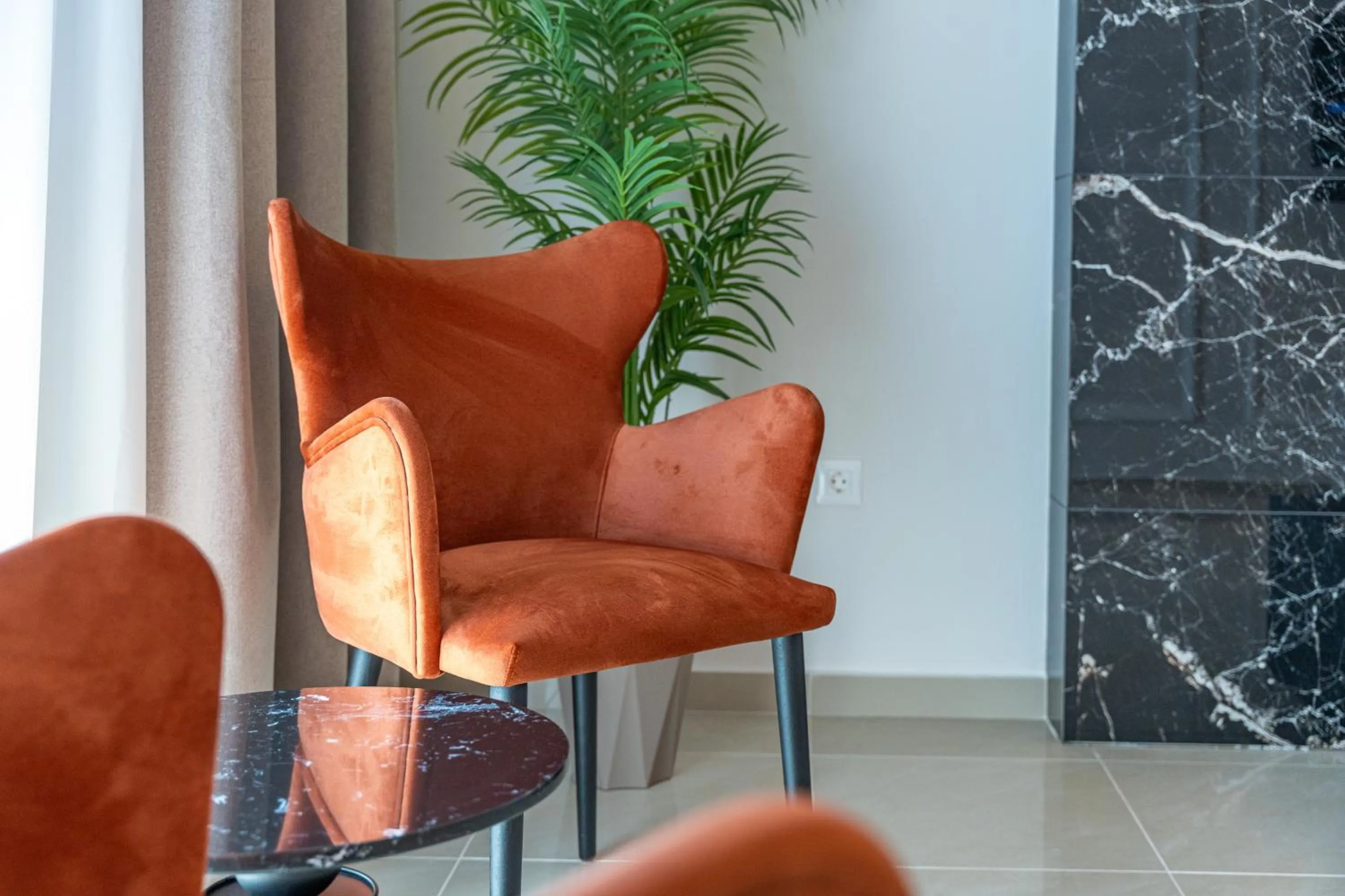 Seating area in Philia Center Suites