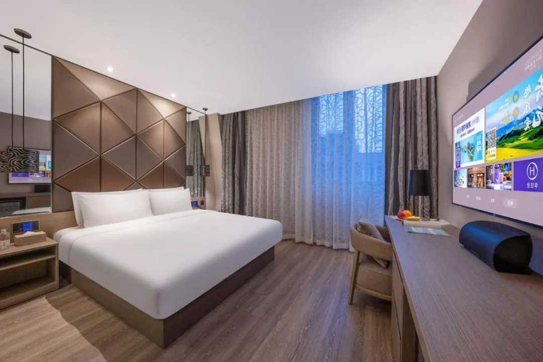 Photo of the whole room, Bed in Tianjin Jinwan Plaza Orange Crystal Hotel
