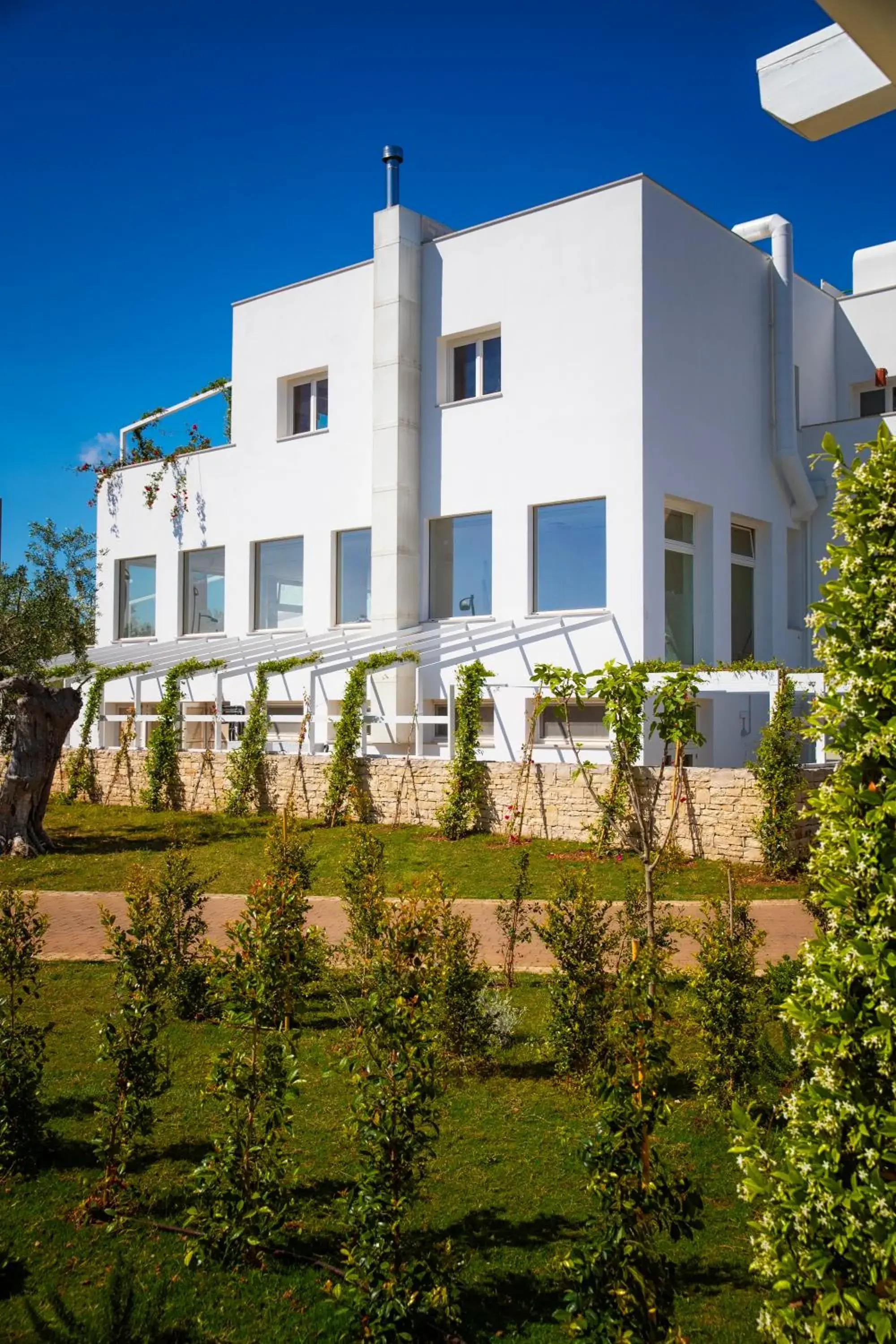 Property building in Cala Ponte, a Tribute Portfolio Hotel Property building in Cala Ponte, a Tribute Portfolio Hotel