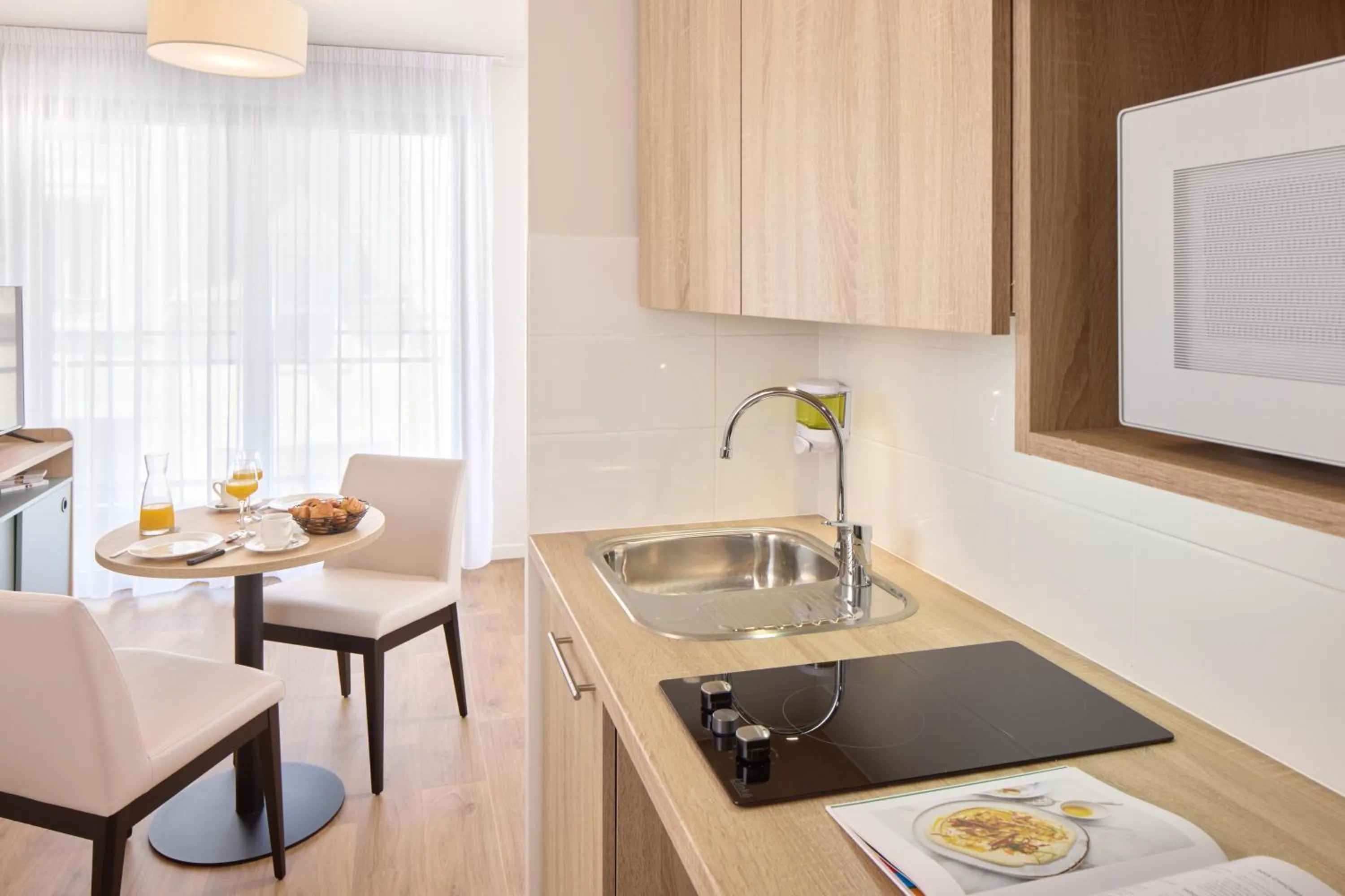 Kitchen or kitchenette in Quality Aparthotel Cherbourg