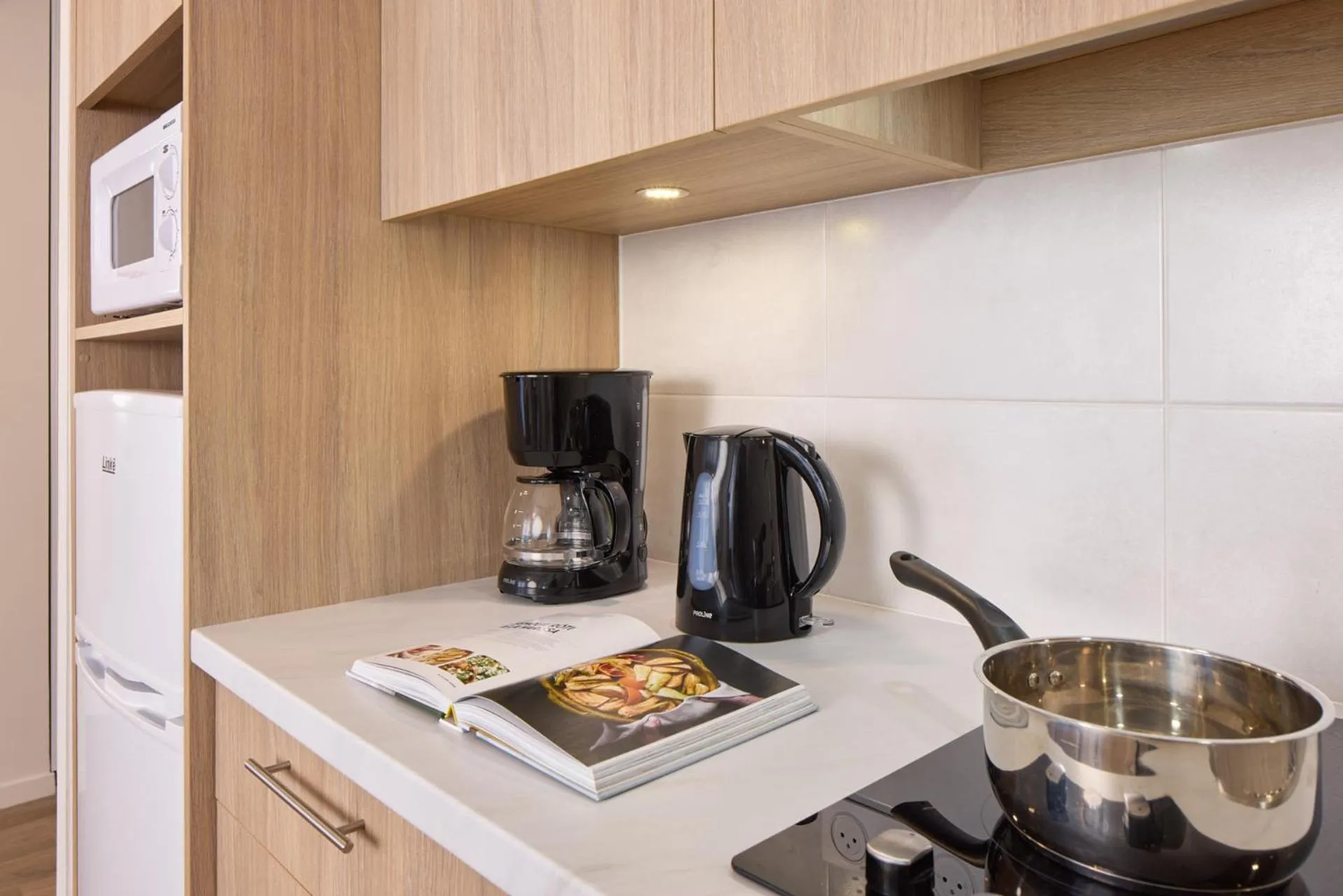 Kitchen or kitchenette in Quality Aparthotel Saumur