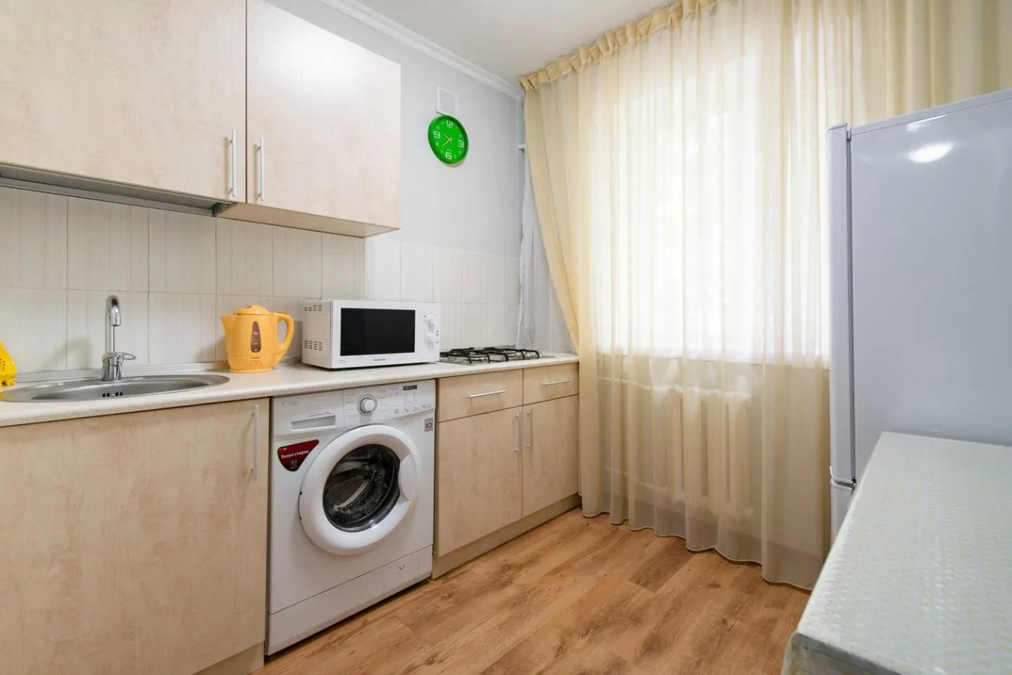 Kitchen or kitchenette in Nadezhda Apartments on Abay Avenue 59