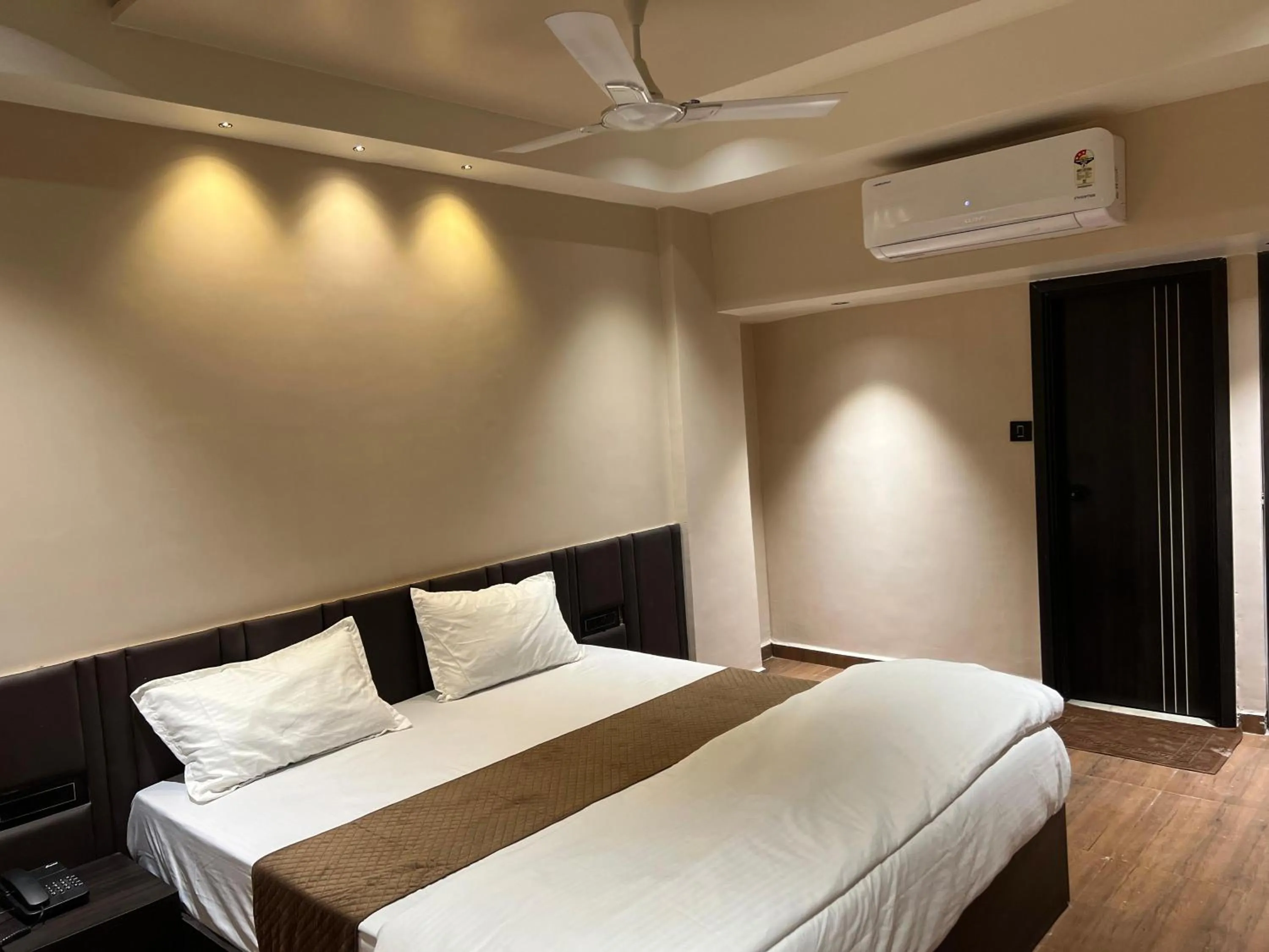 Bed in Hotel Presidency - Best Hotel in Surat
