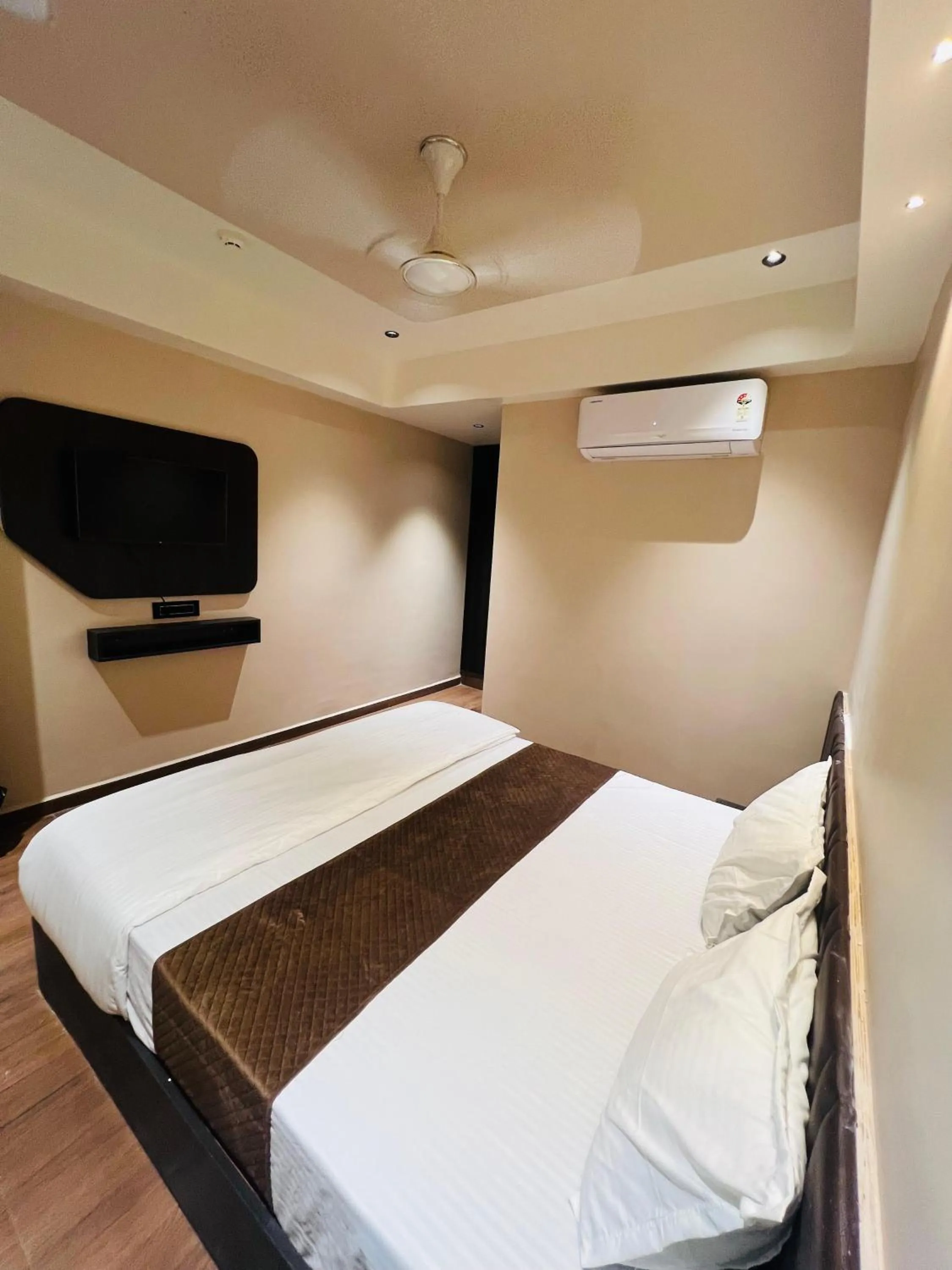 Bed in Hotel Presidency - Best Hotel in Surat