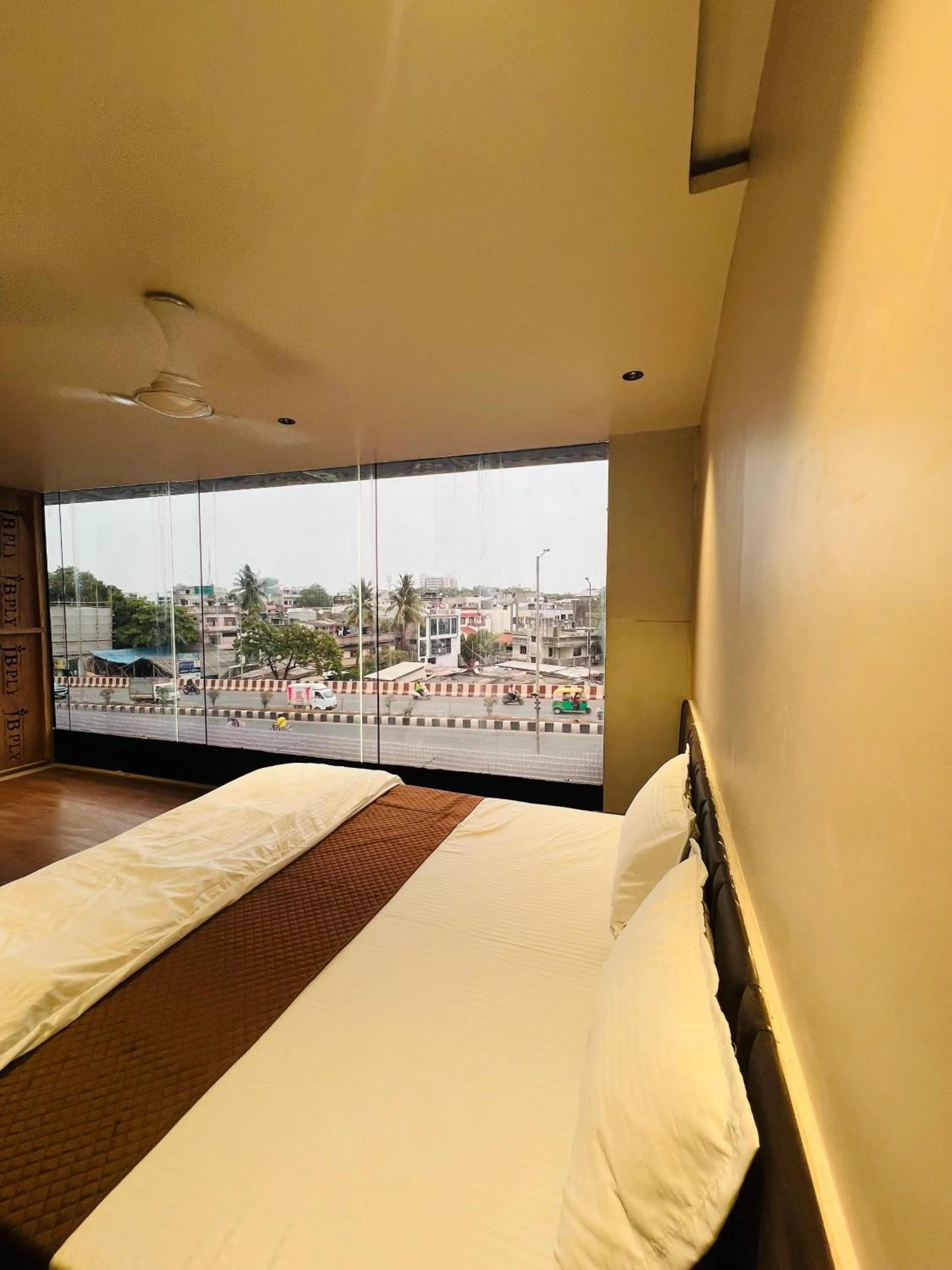 Bed in Hotel Presidency - Best Hotel in Surat
