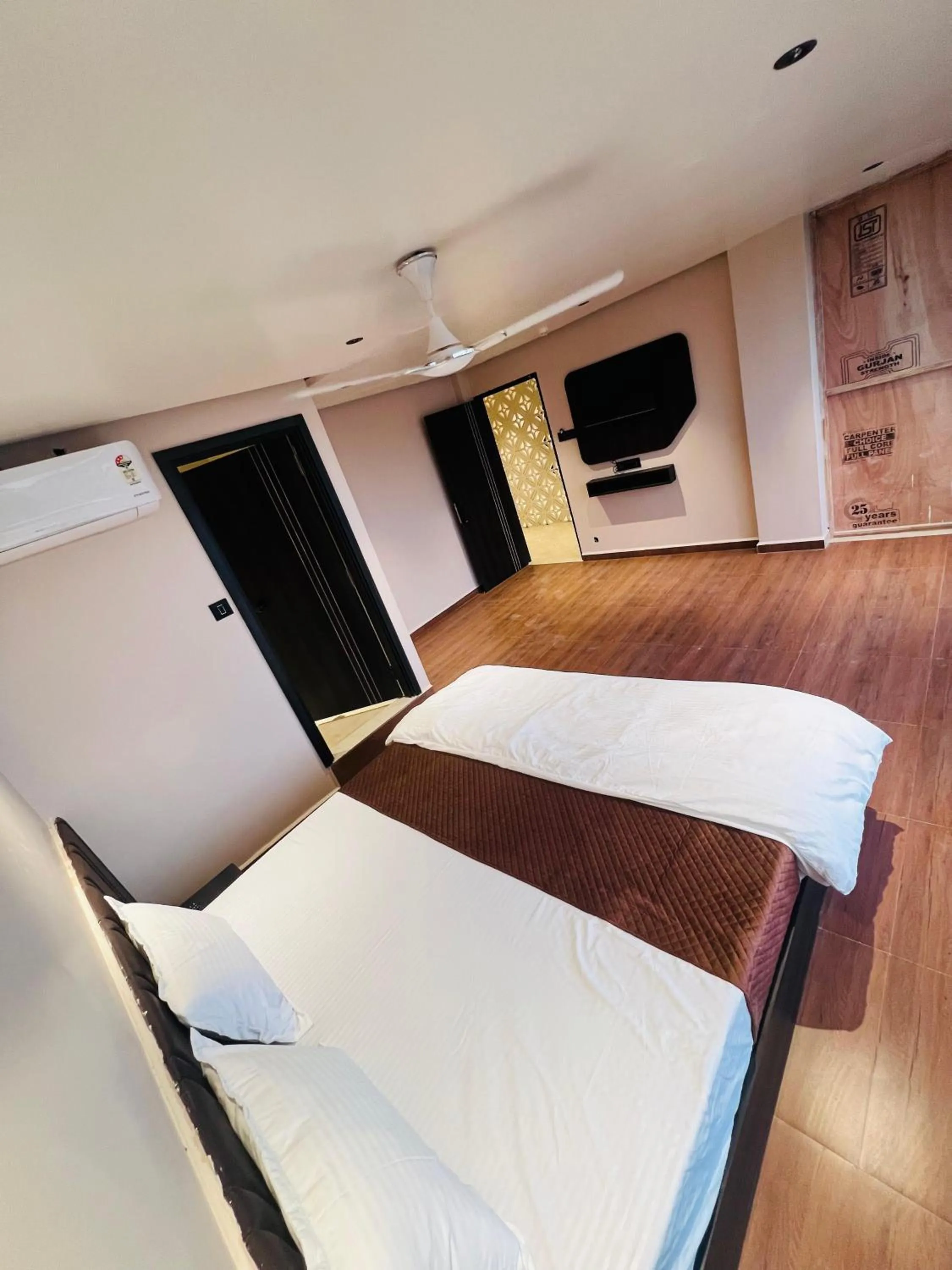 Bed in Hotel Presidency - Best Hotel in Surat