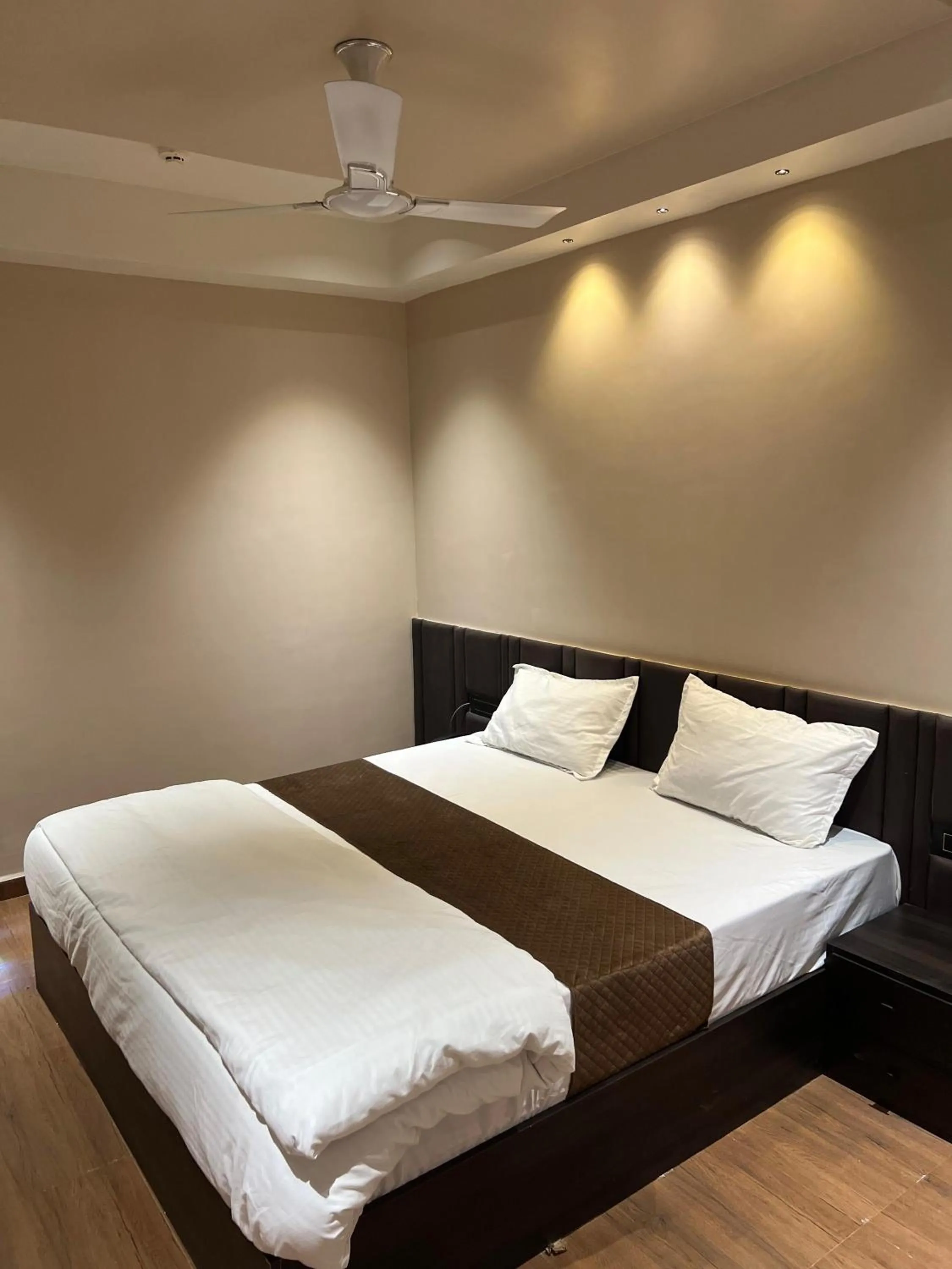 Bed in Hotel Presidency - Best Hotel in Surat