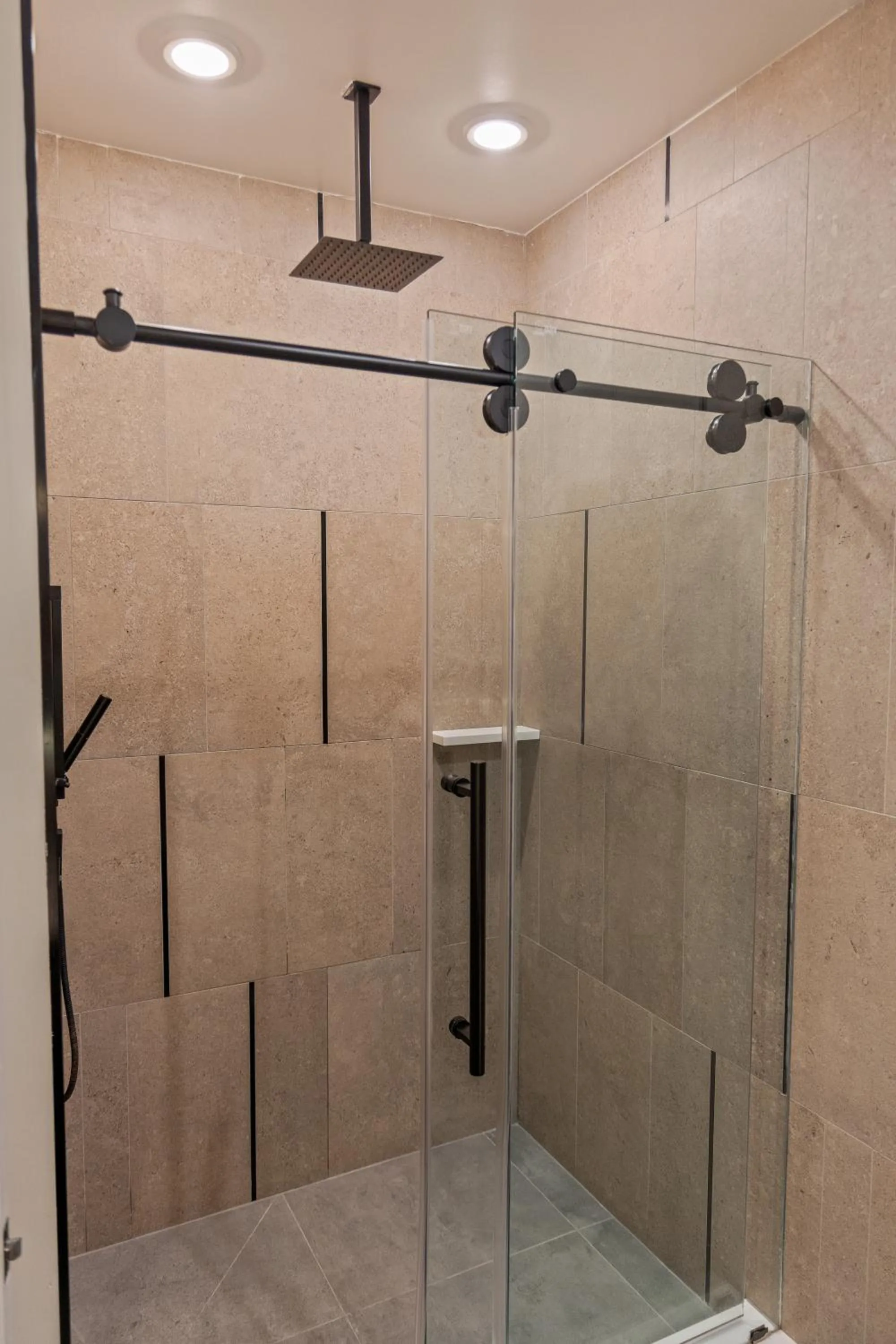 Shower in Sosuite at The Onyx - Museum District
