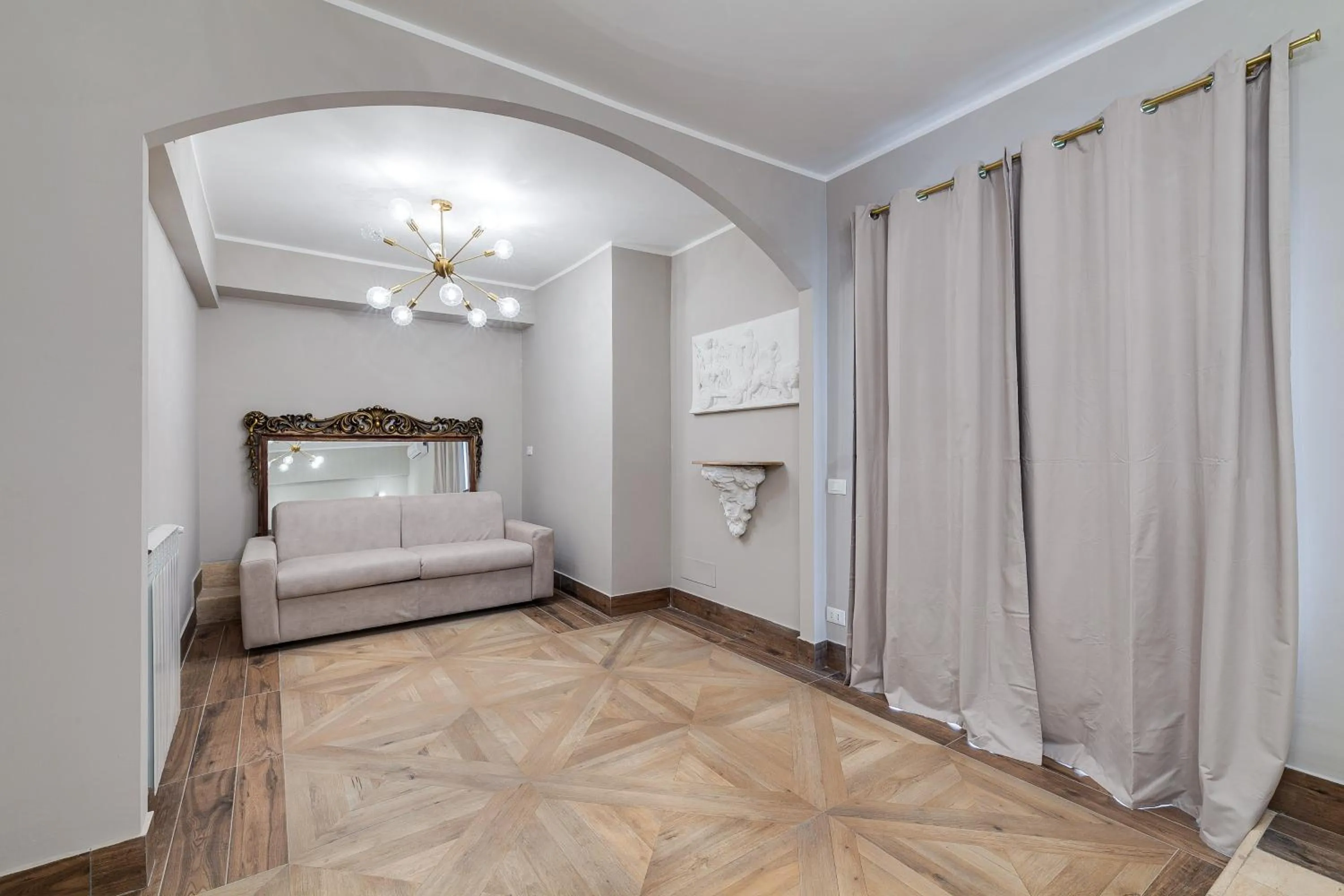 Living room, Bed in Vogue Suites Rome