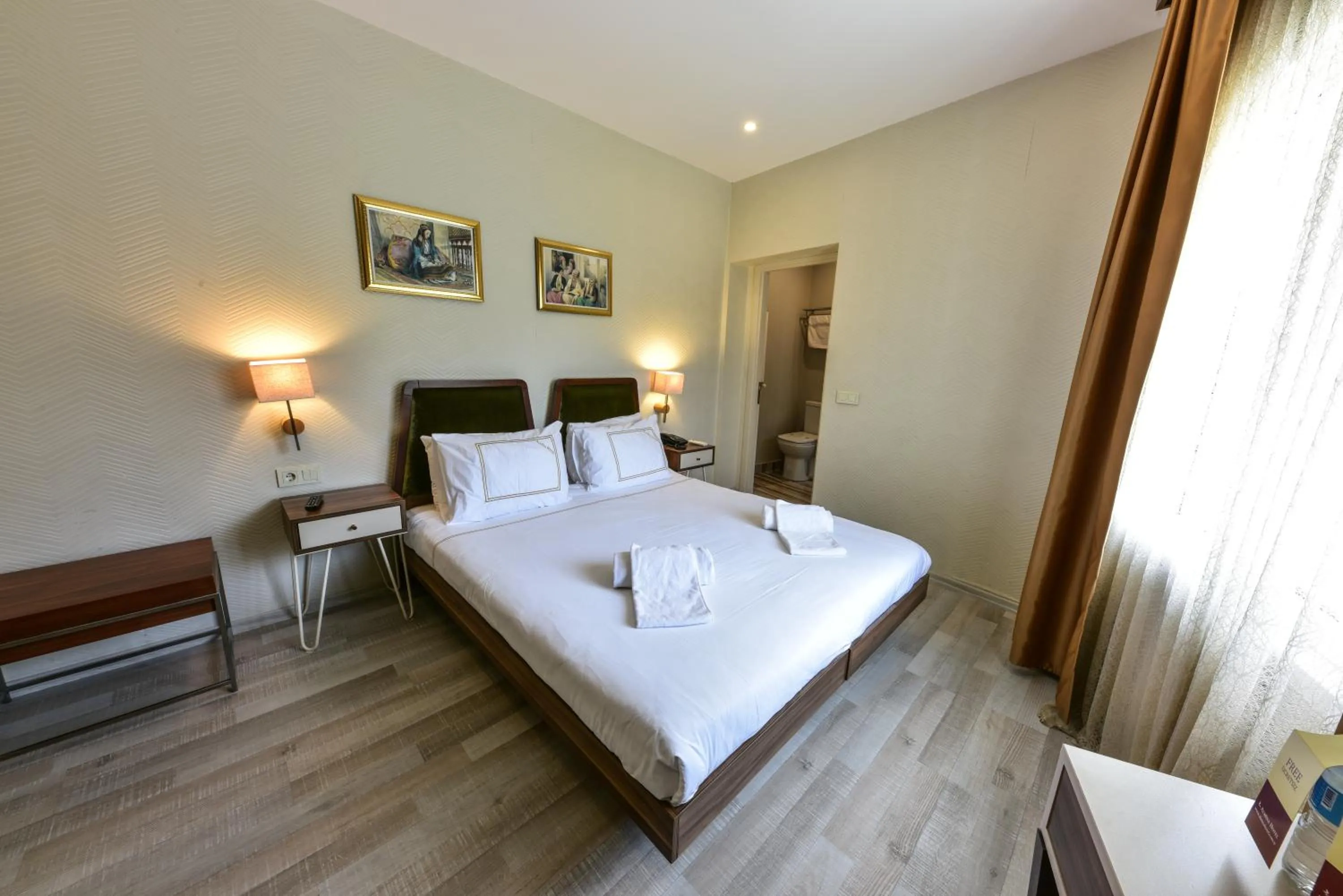 Bed in Almina Guest House