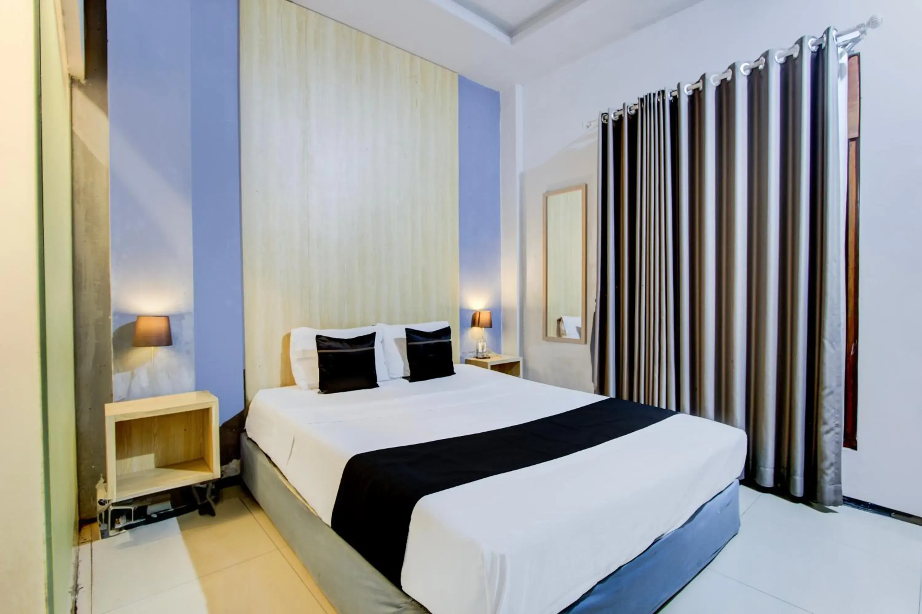 Deluxe Double Room in Hotel O Tegal near near Pacific Mall Tegal formerly Hugo Suites Family Deluxe Double Room in Hotel O Tegal near near Pacific Mall Tegal formerly Hugo Suites Family
