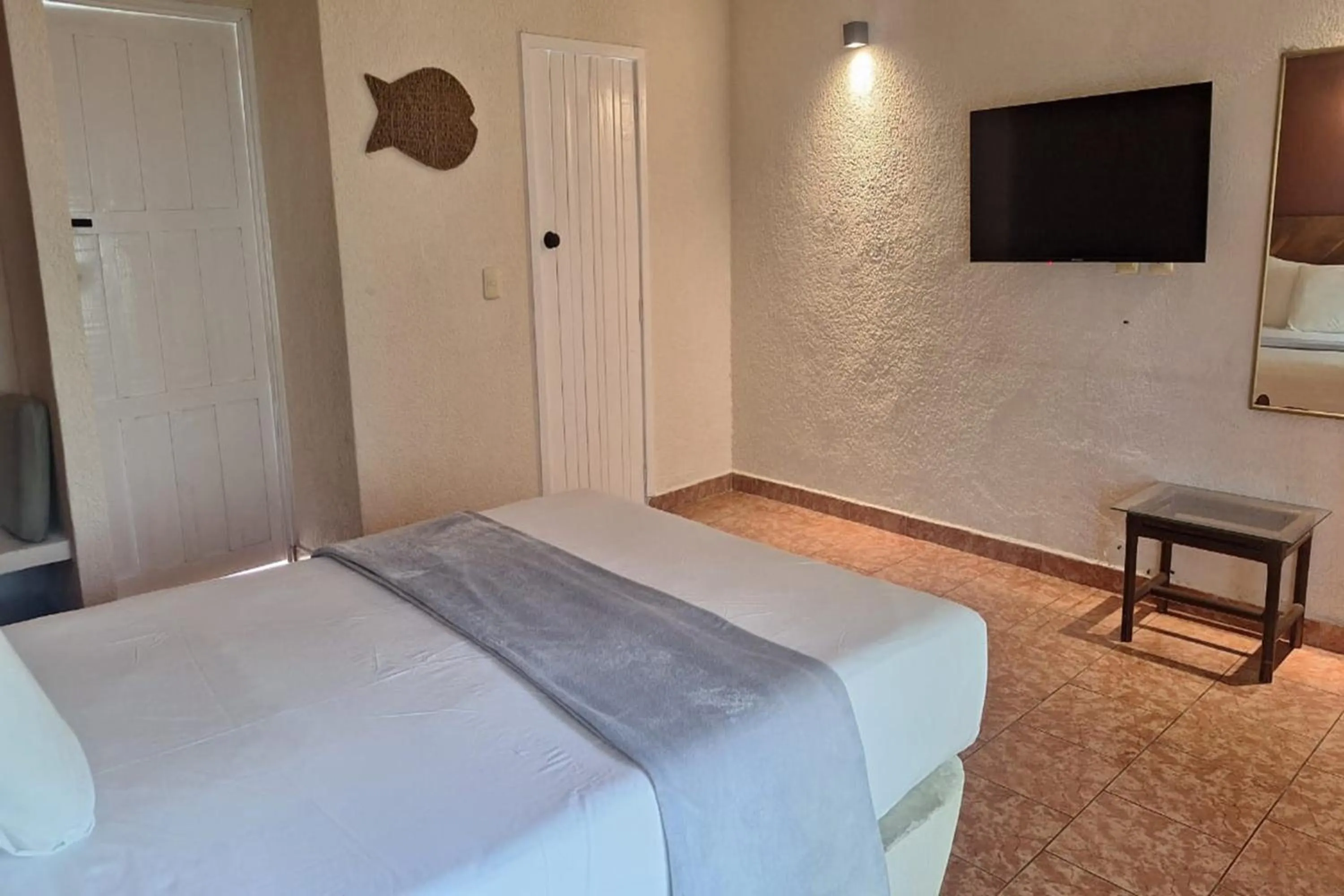 Bedroom, Bed in Capital O Hotel Rolovi Cancún