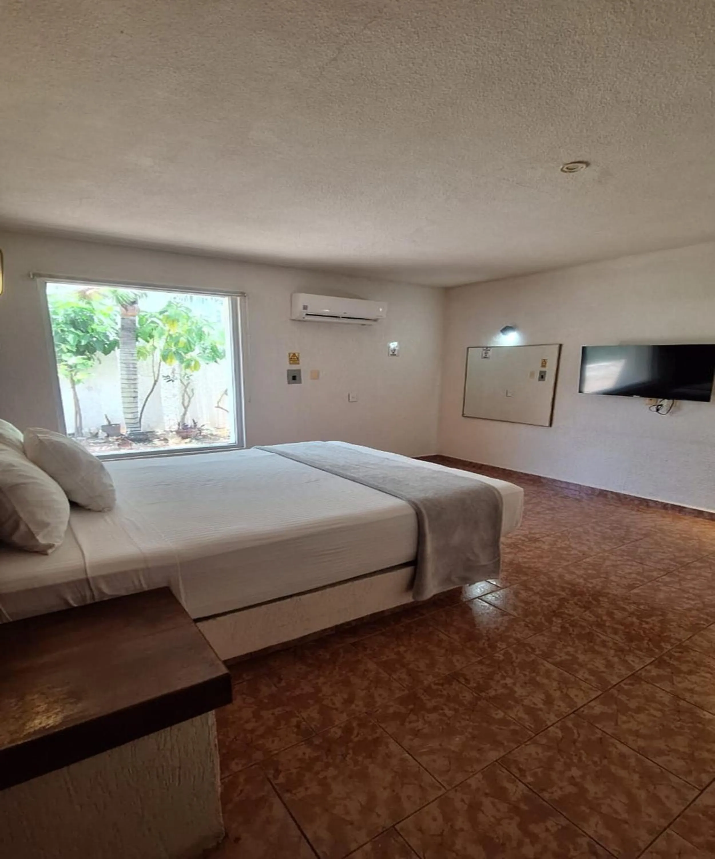 Bedroom, Bed in Capital O Hotel Rolovi Cancún