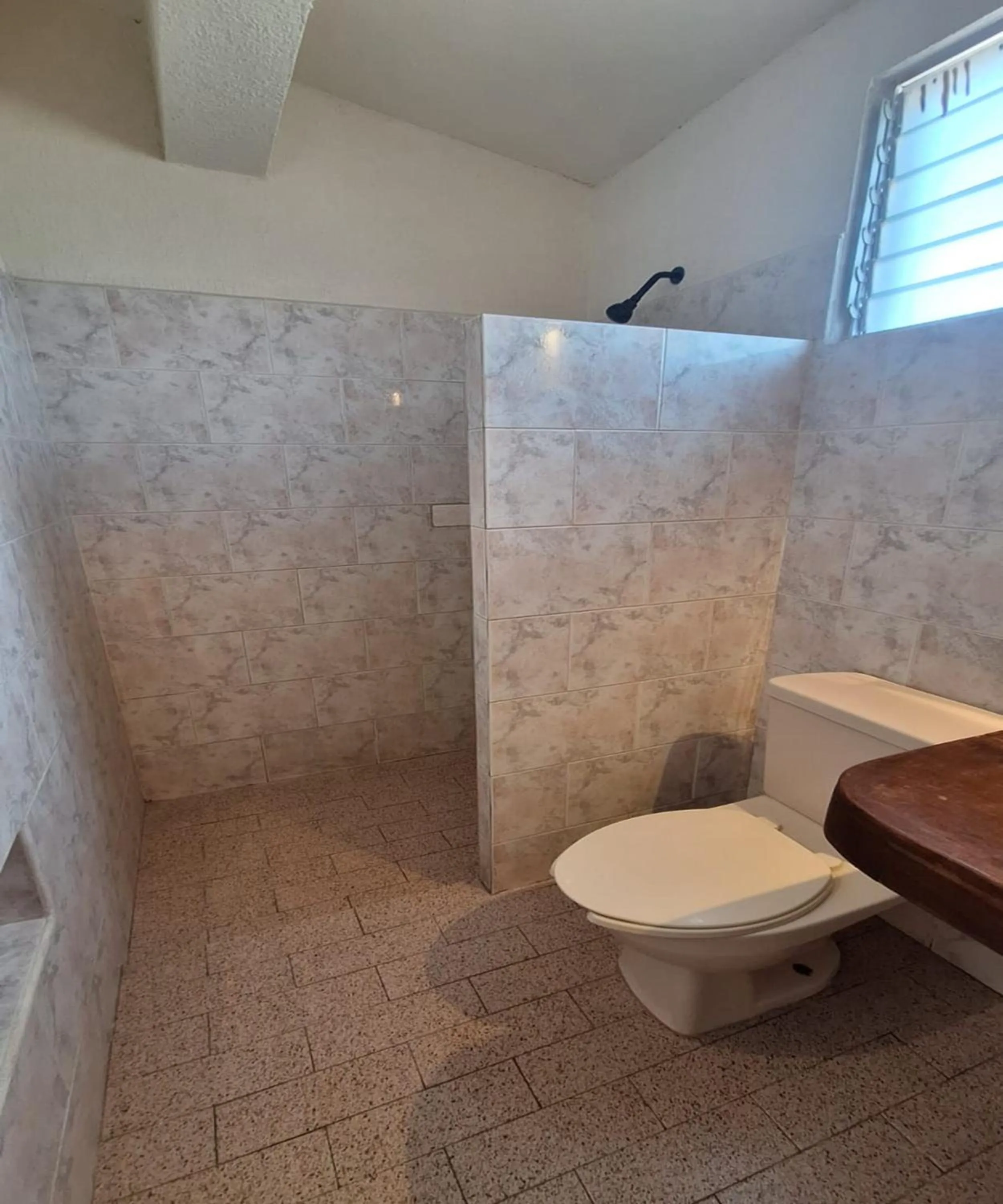 Bathroom in Capital O Hotel Rolovi Cancún