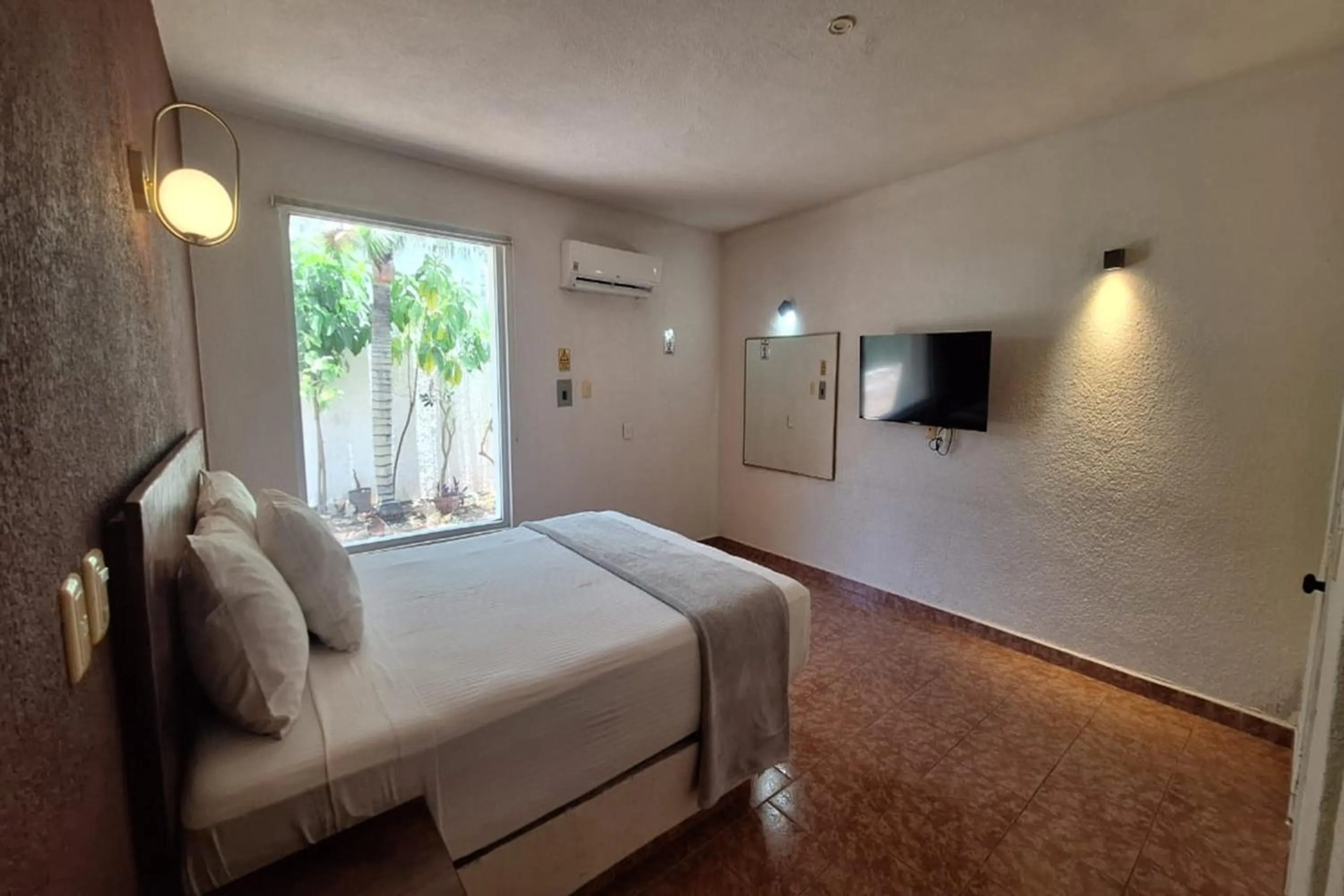 Bedroom, Bed in Capital O Hotel Rolovi Cancún