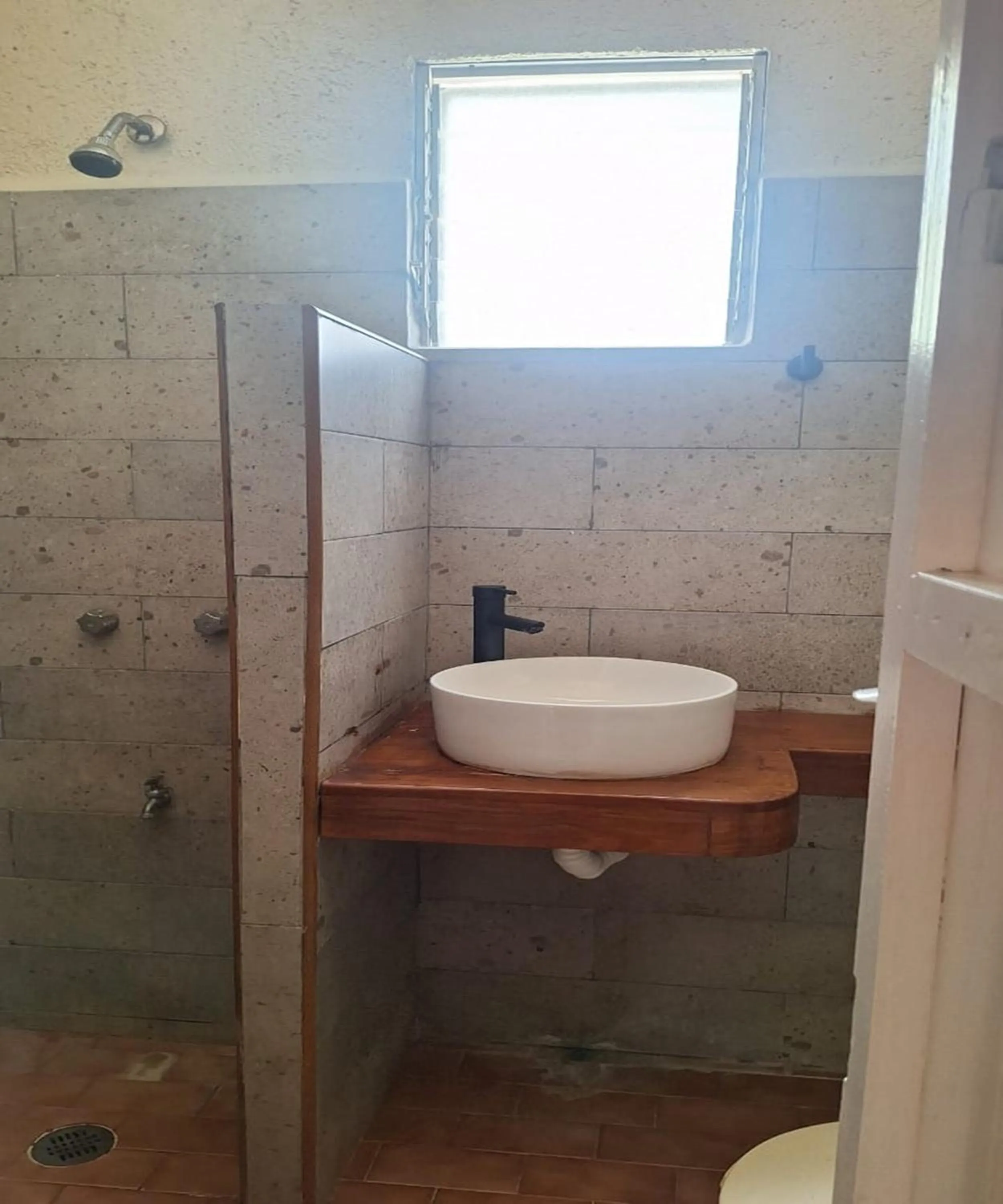 Bathroom in Capital O Hotel Rolovi Cancún