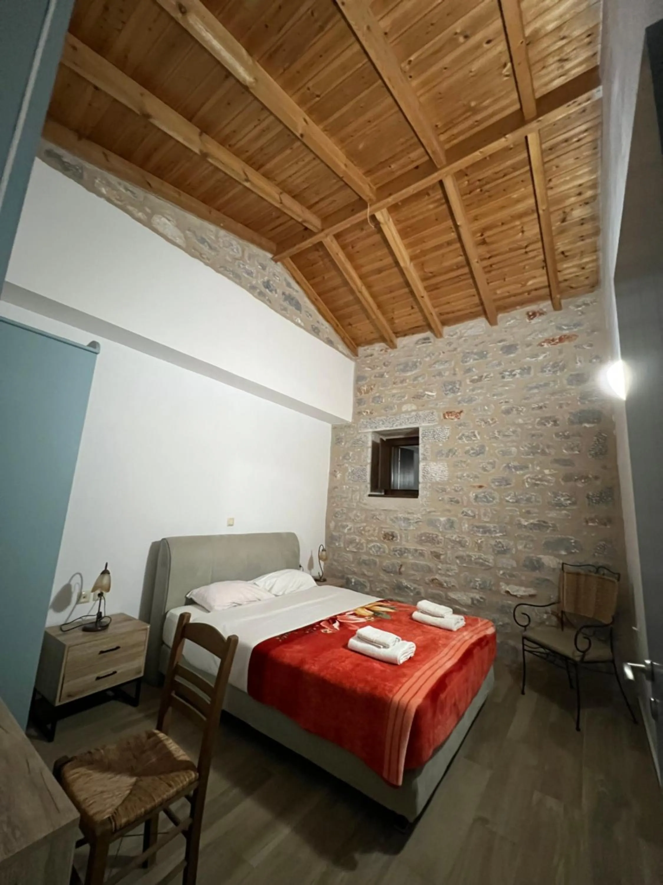 Bed in Koukouri Suites