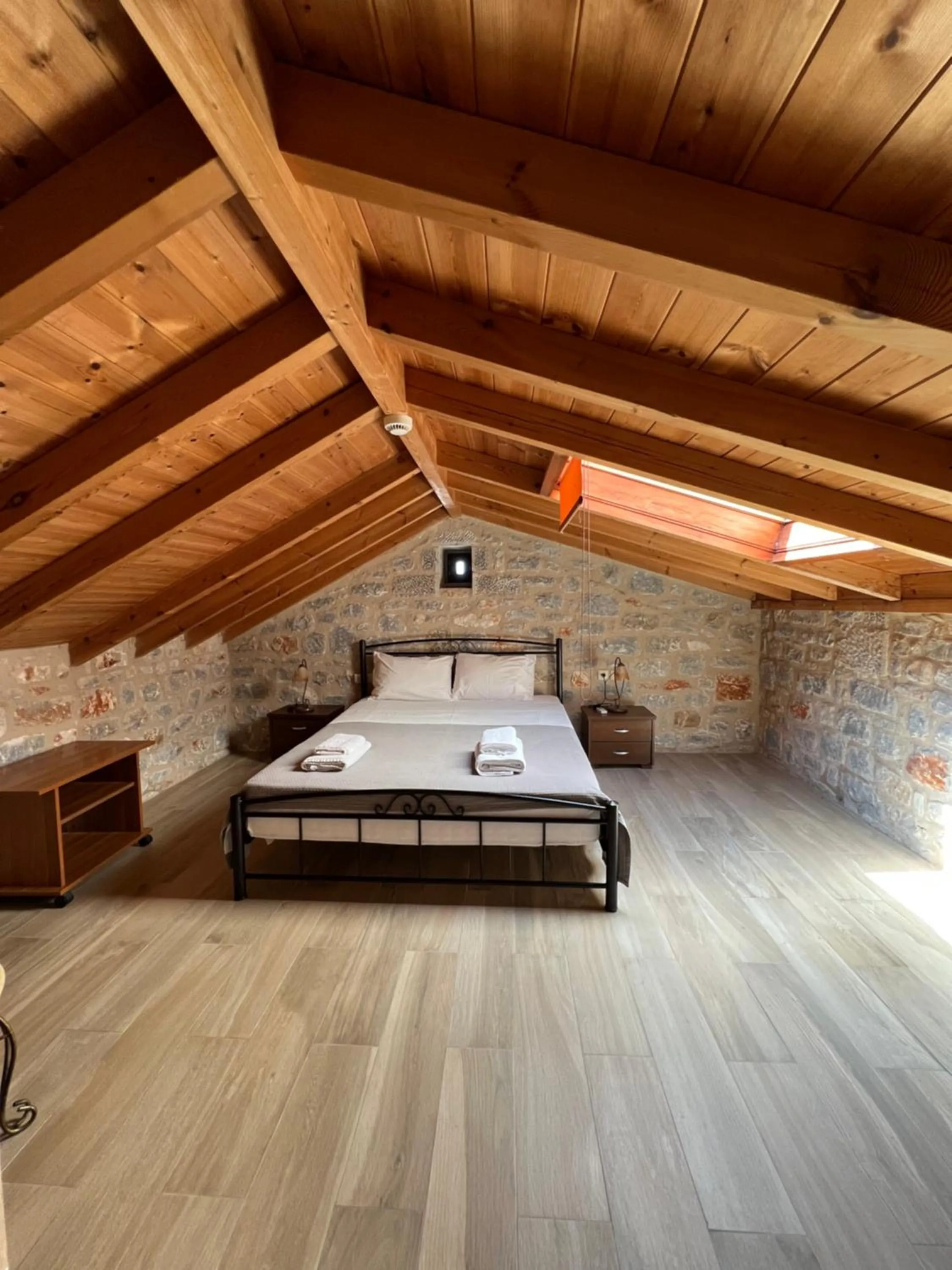 Bed in Koukouri Suites