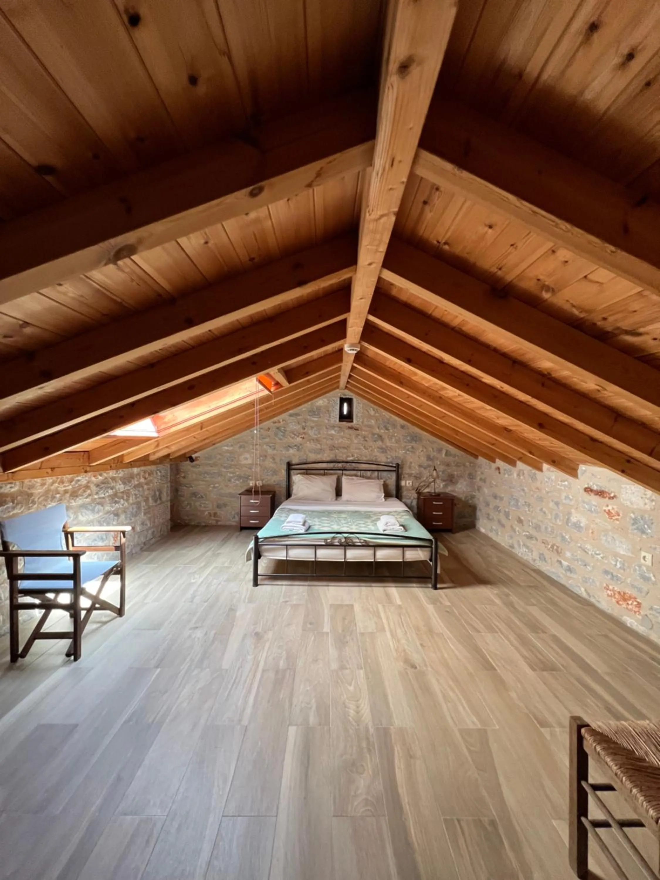 Bed in Koukouri Suites