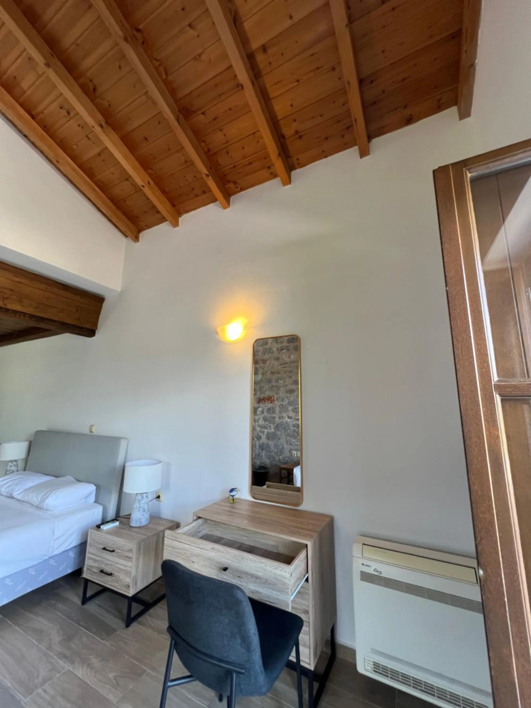 Bed in Koukouri Suites