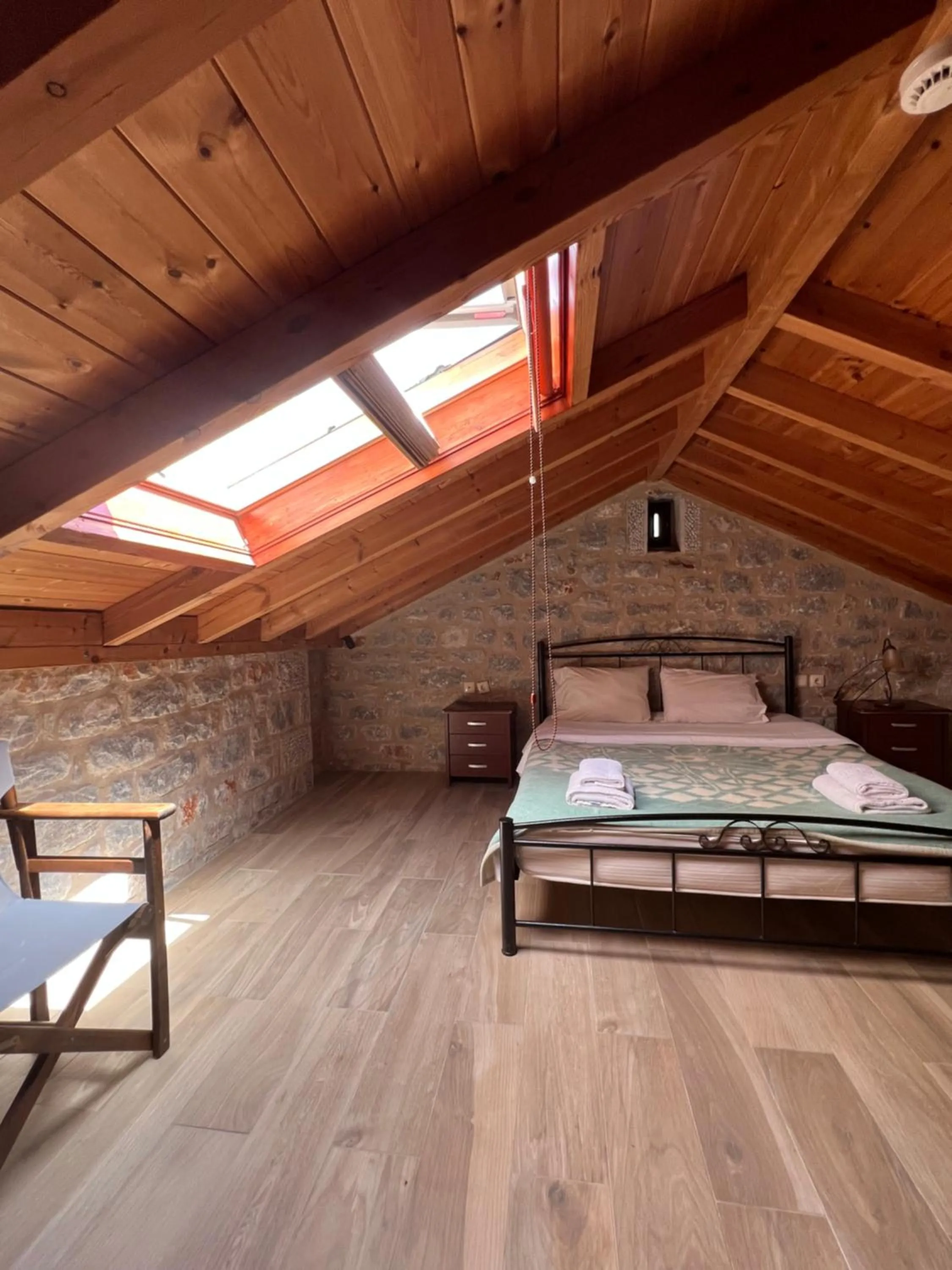 Bed in Koukouri Suites