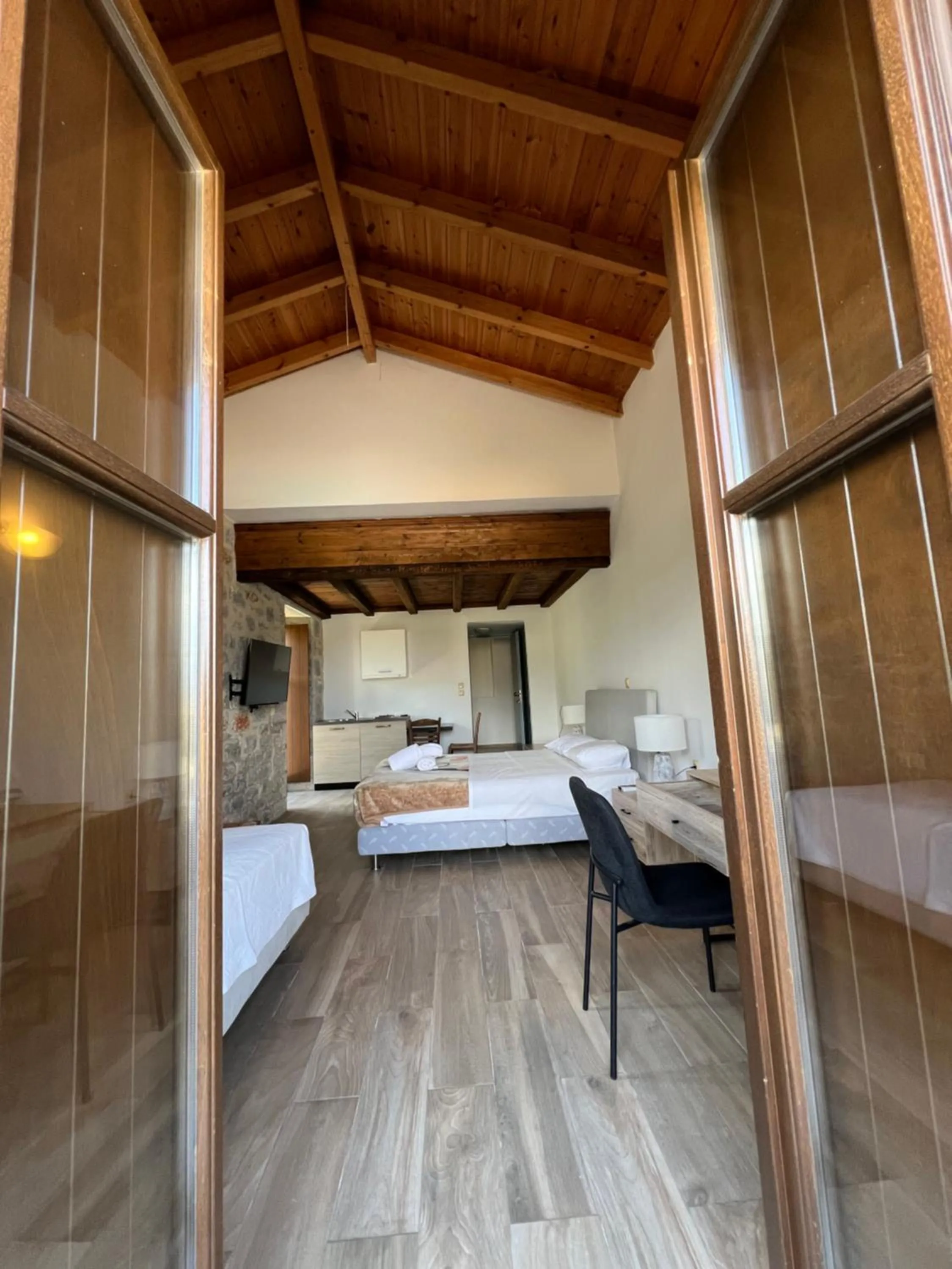 Bed in Koukouri Suites