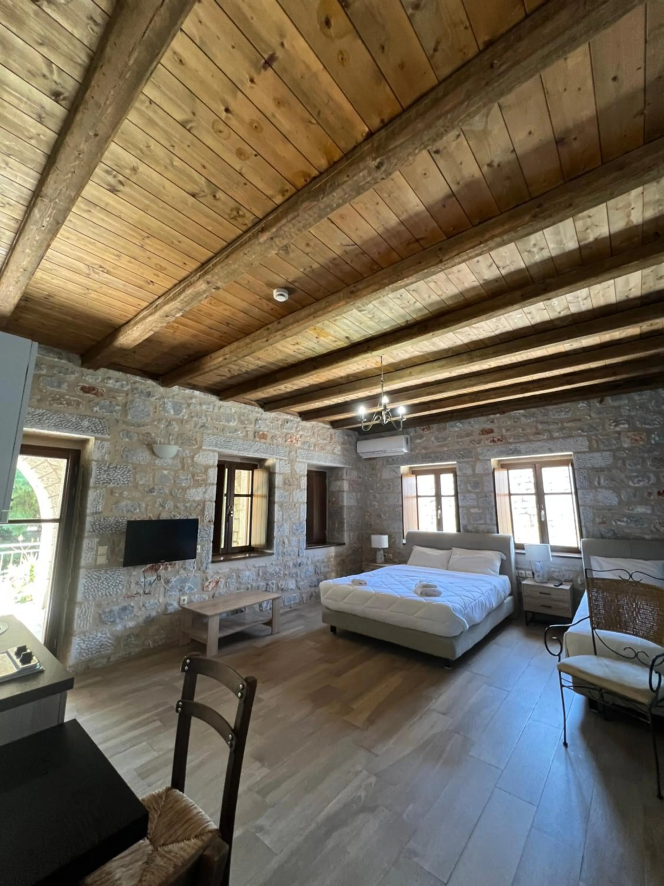 Bed in Koukouri Suites