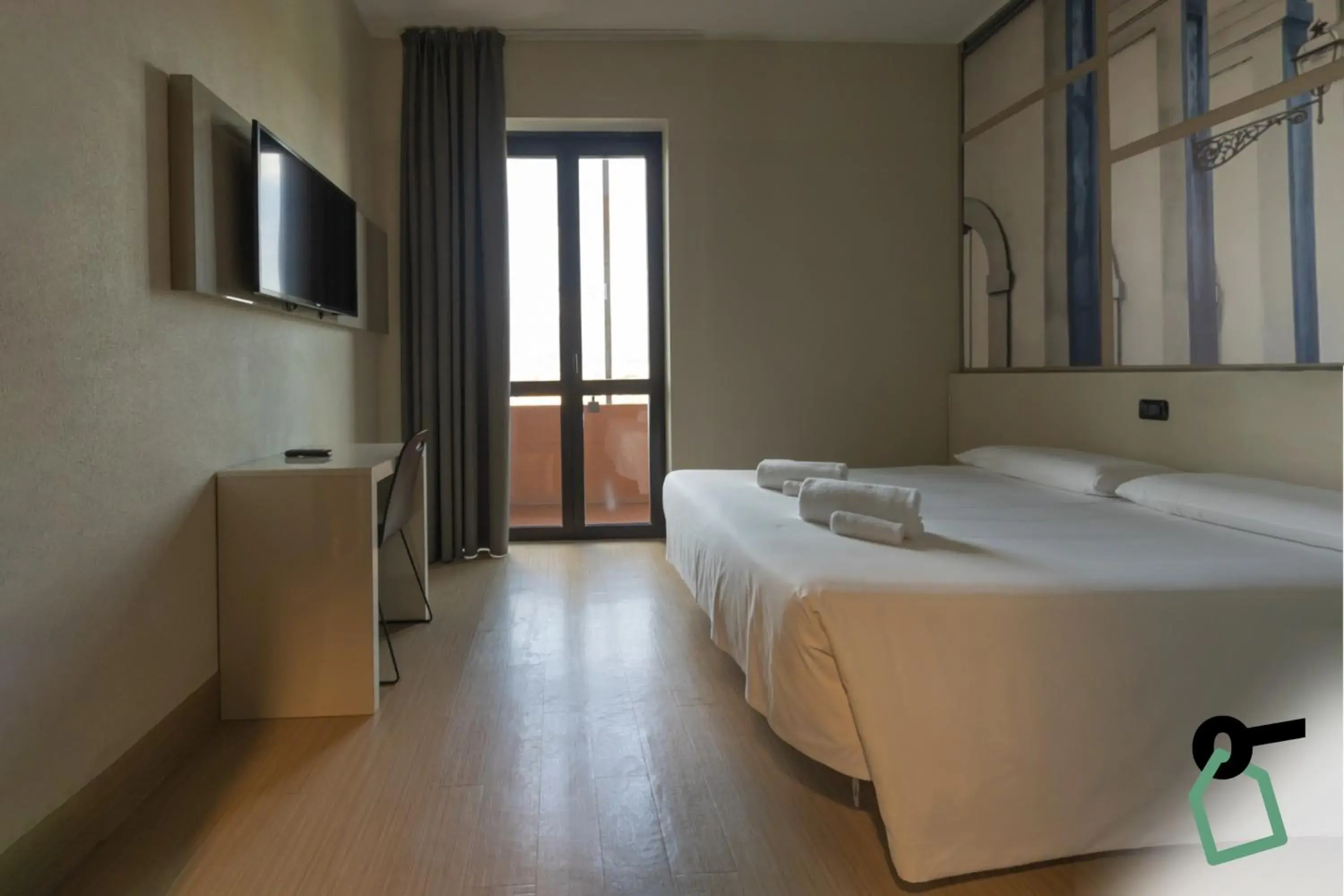 Photo of the whole room, Bed in Hotiday Firenze Guidoni Photo of the whole room, Bed in Hotiday Firenze Guidoni