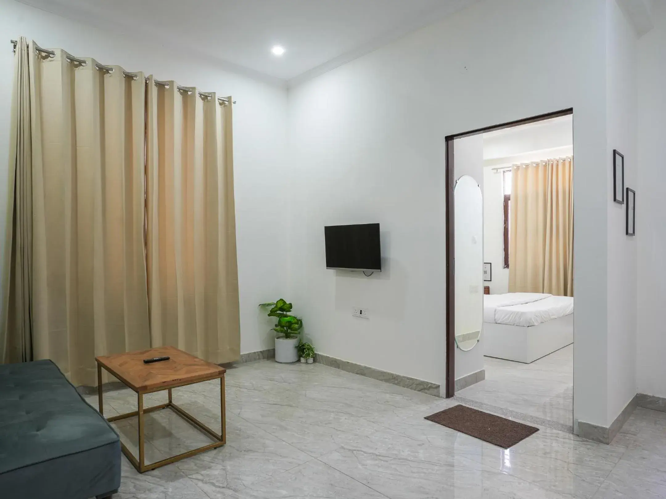 Seating area, Bed in Thamosa Stays Seating area, Bed in Thamosa Stays