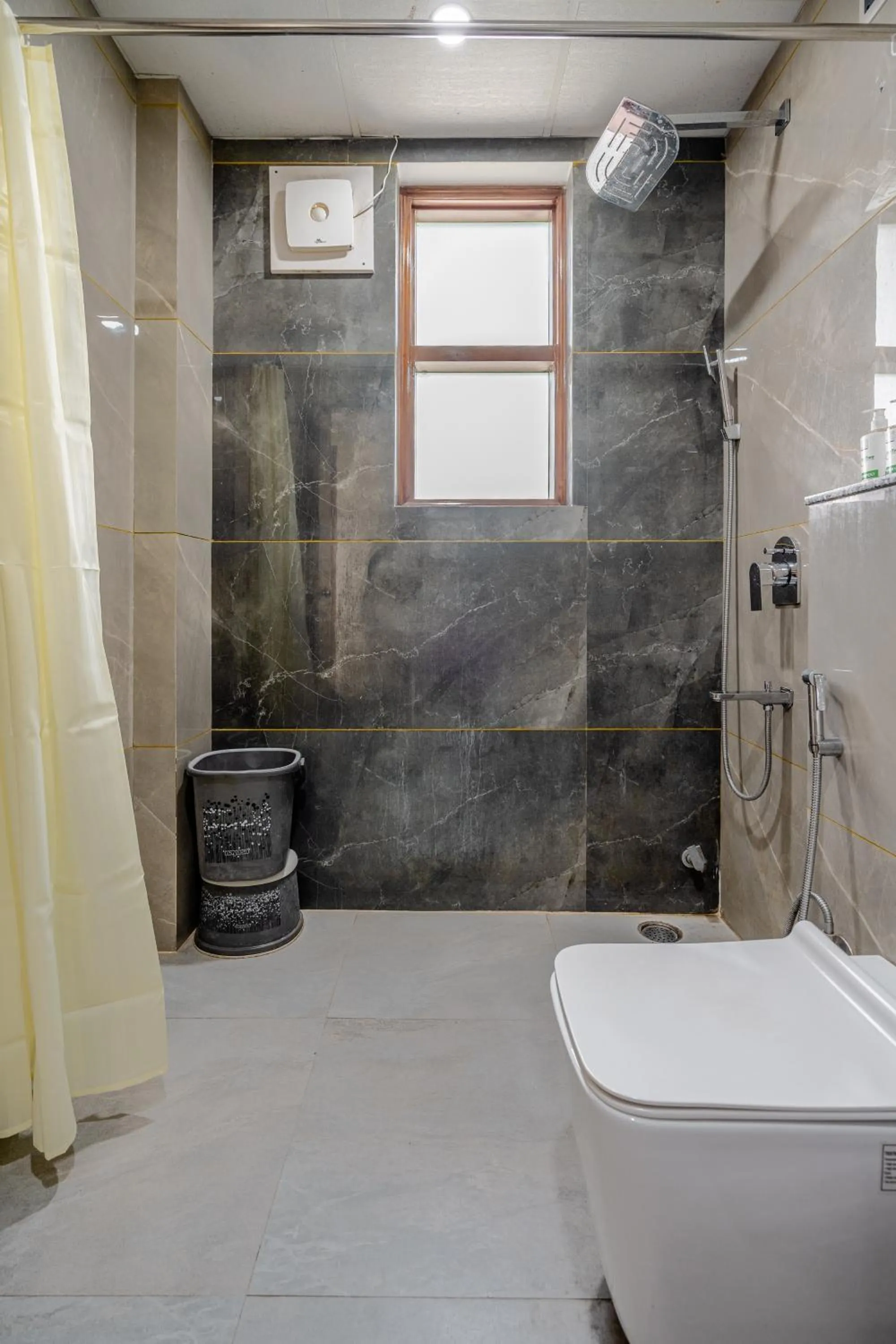 Bathroom in Lime Tree Hotel - Near Medanta Hospital