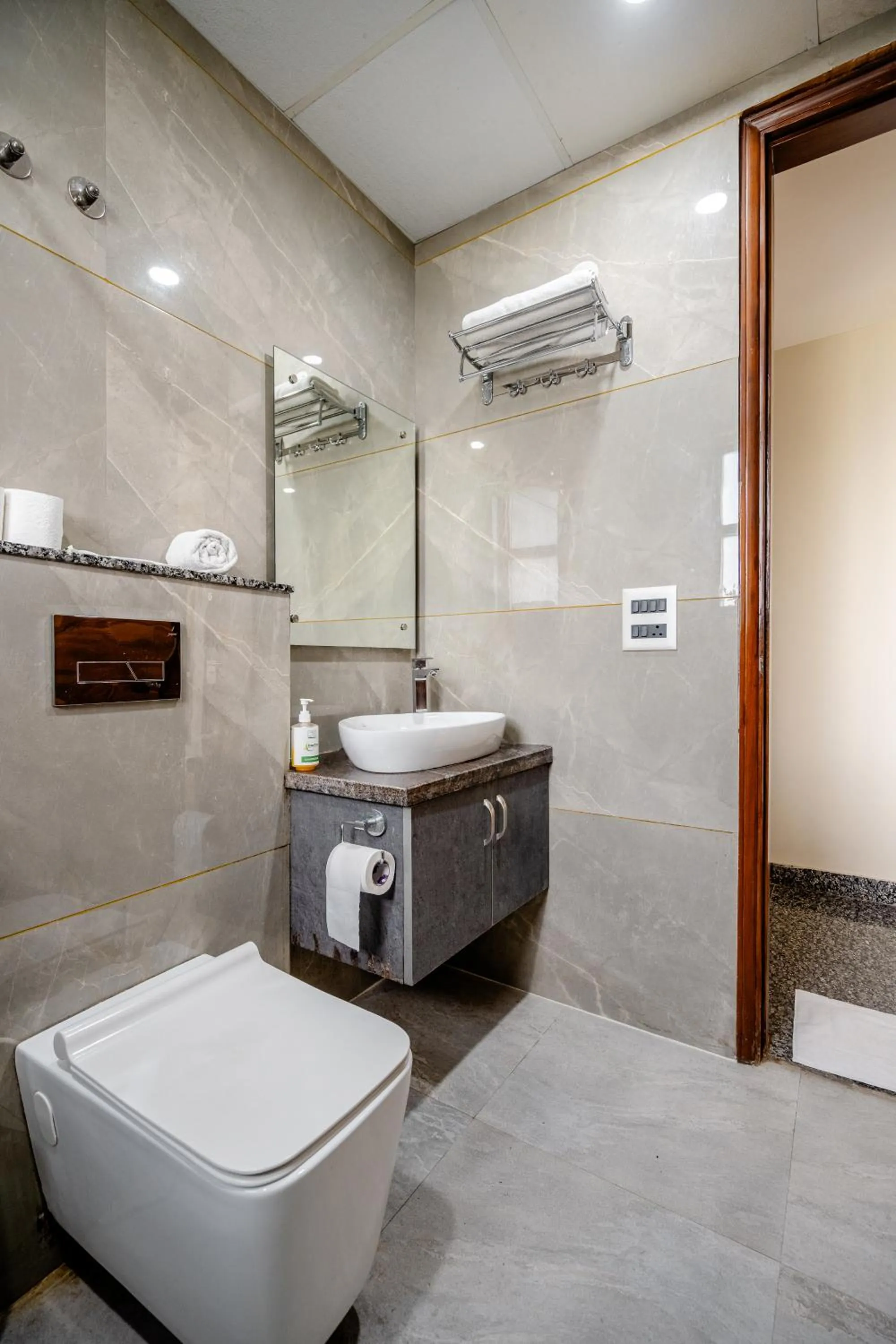 Bathroom in Lime Tree Hotel - Near Medanta Hospital