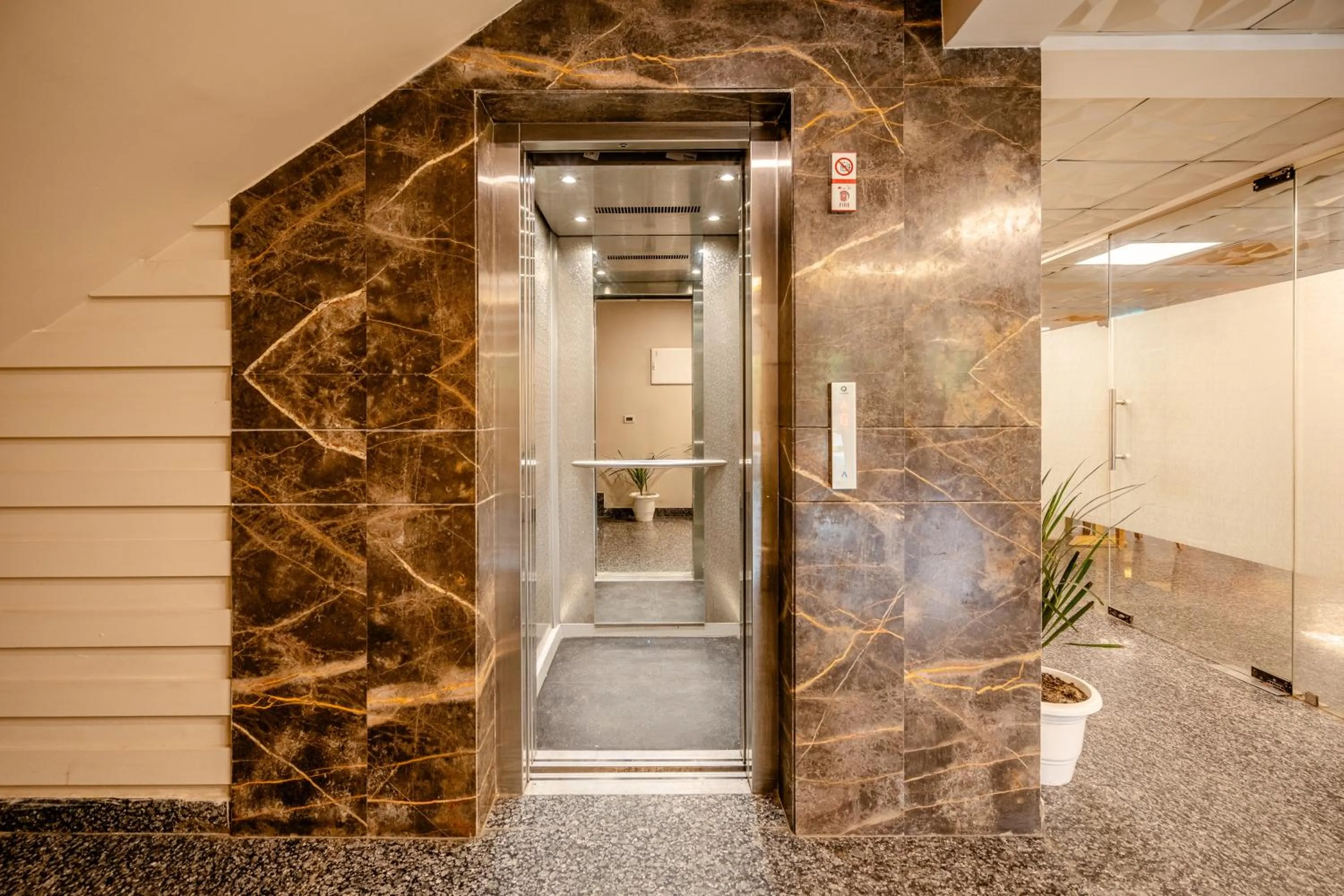 elevator in Lime Tree Hotel - Near Medanta Hospital