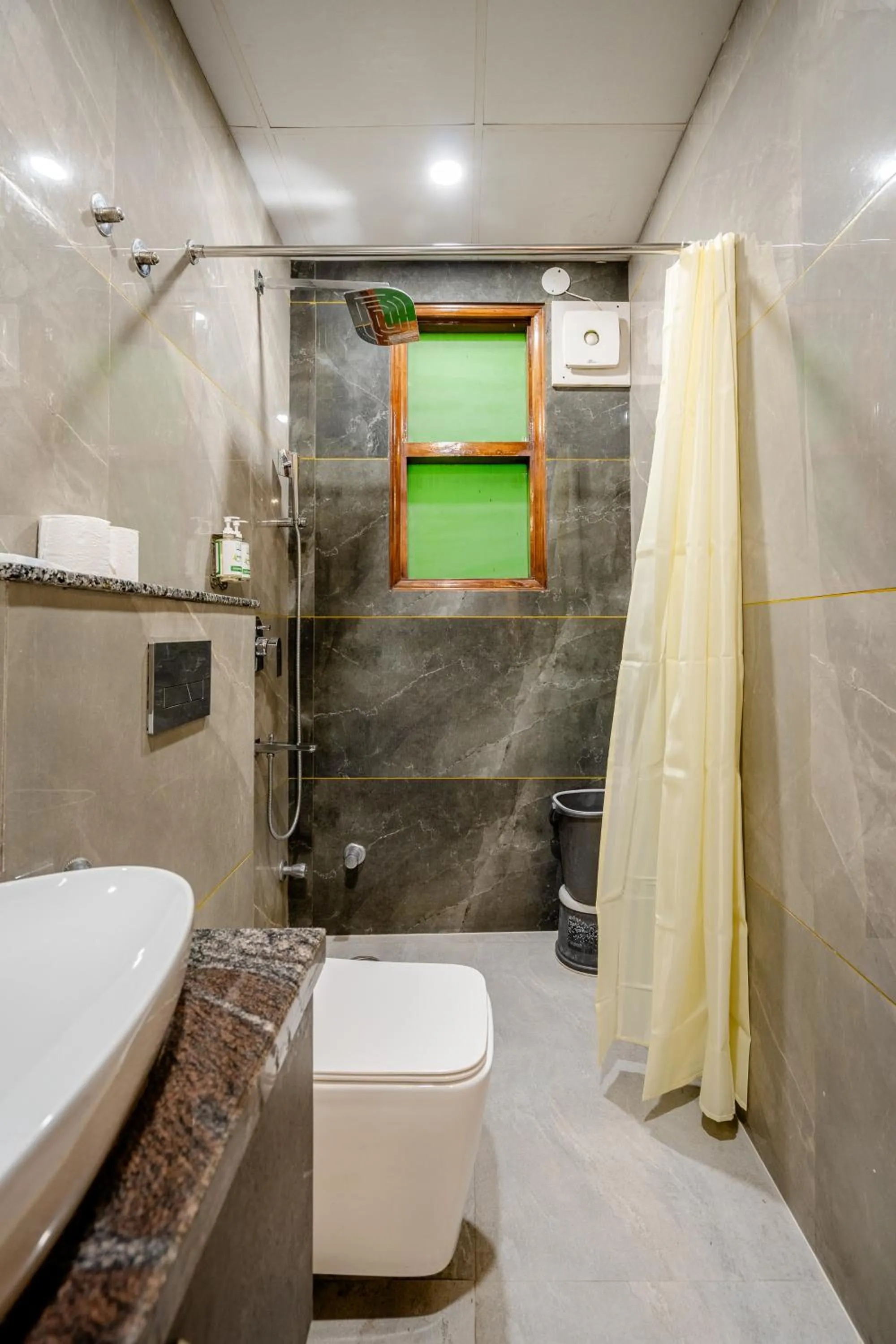 Shower in Lime Tree Hotel - Near Medanta Hospital