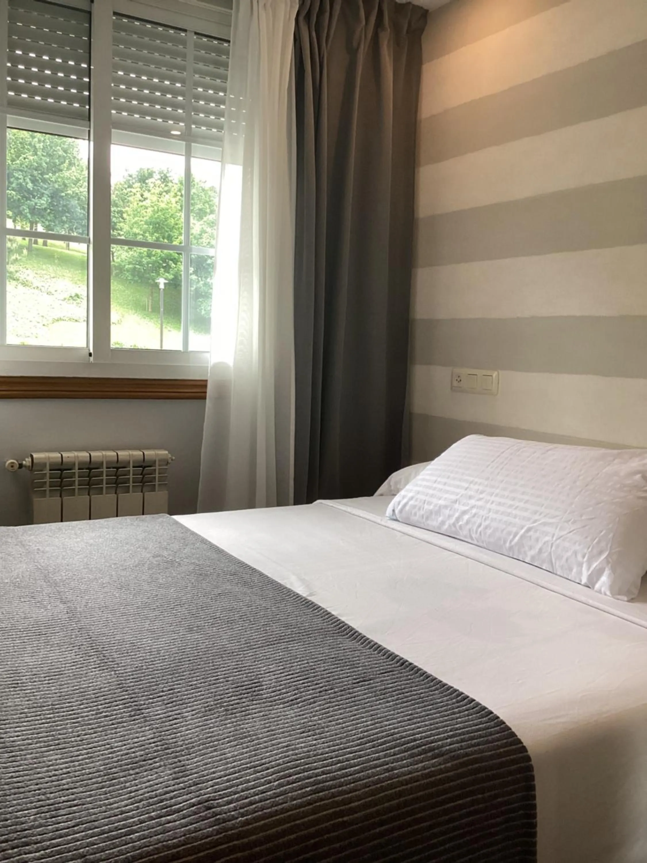 Bed in Saudade Hostal Cafetería